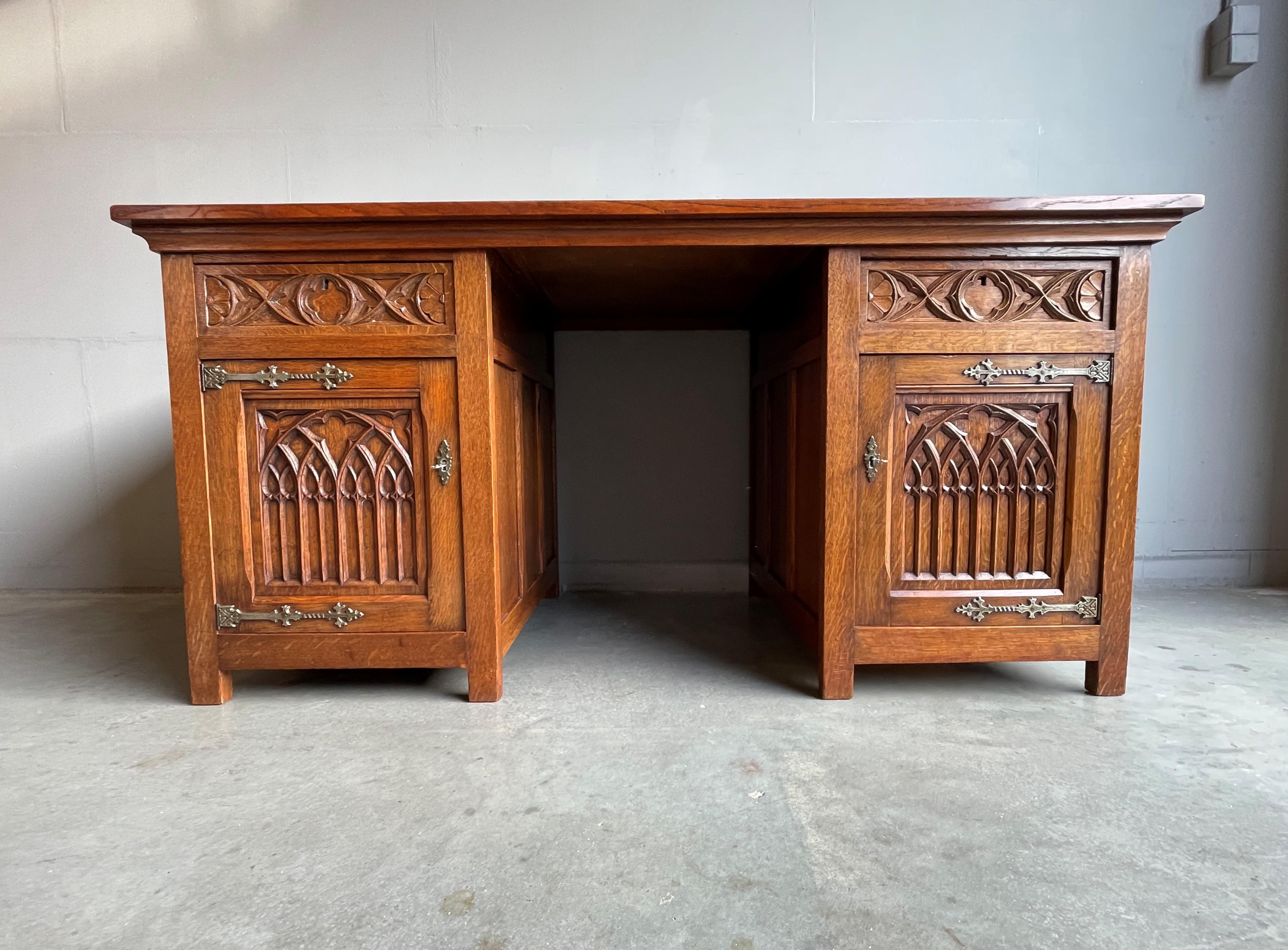 Wonderful Gothic Revival desk with an amazing presence and patina.

If you like Gothic Revival furniture then we are certain you will like this quality carved Gothic desk. This good size and highly practical specimen comes with very attractive,