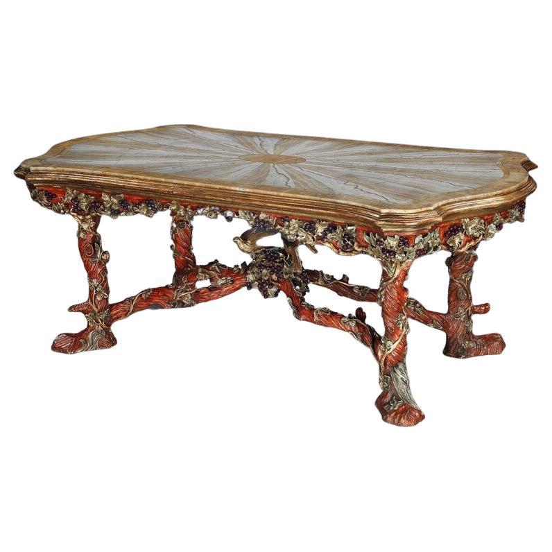 Exceptionnelle table centrale polychrome italienne en bois sculpté avec plateau en onyx par Amulet  en vente