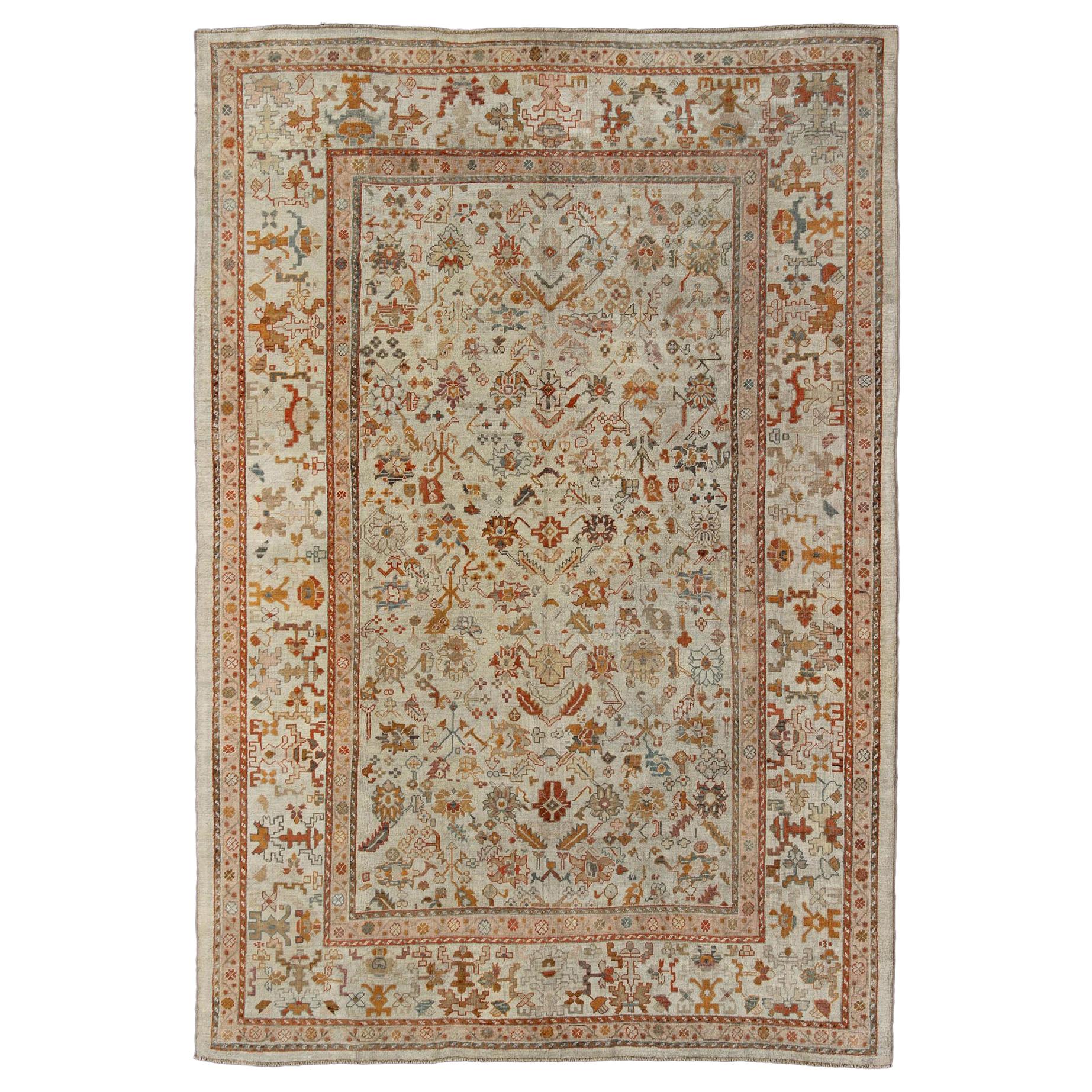 Outstanding Ivory Background Antique Turkish Oushak Rug in Multi-Colors