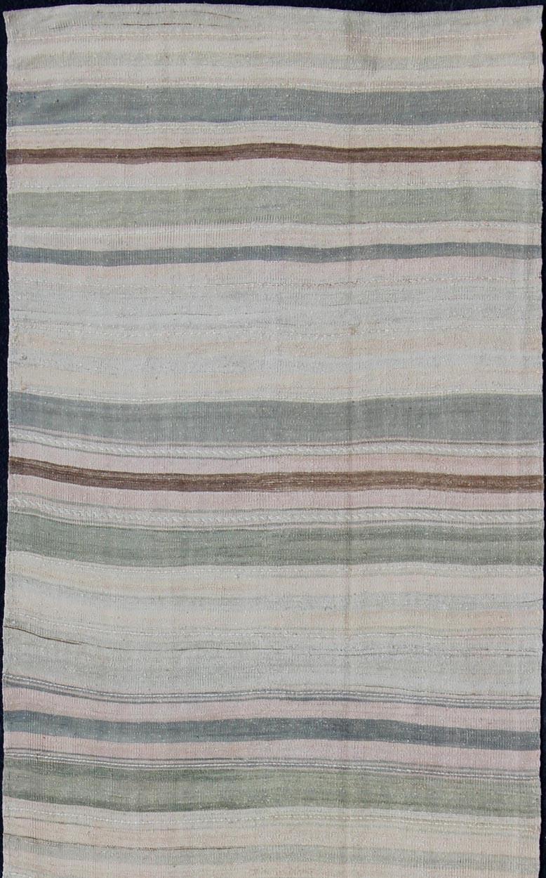 Stripe design Kilim Gallery runner in cream and taupe Green, Blue, gray, light brown and neutrals, rug/EN-179171 , country of origin / type: Turkey / Kilim, circa 1950

This flat-woven long Kilim gallery runner from Turkey features a neutral