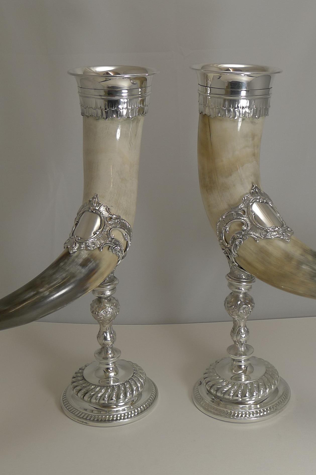 A rare pair of oversized Cornucopia, larger than most and a real show stopper. Probably German in origin, they are marked on the base with a star or daisy mark which I am not familiar with and also E P for Electro-Plated.

Dating to circa 1900,
