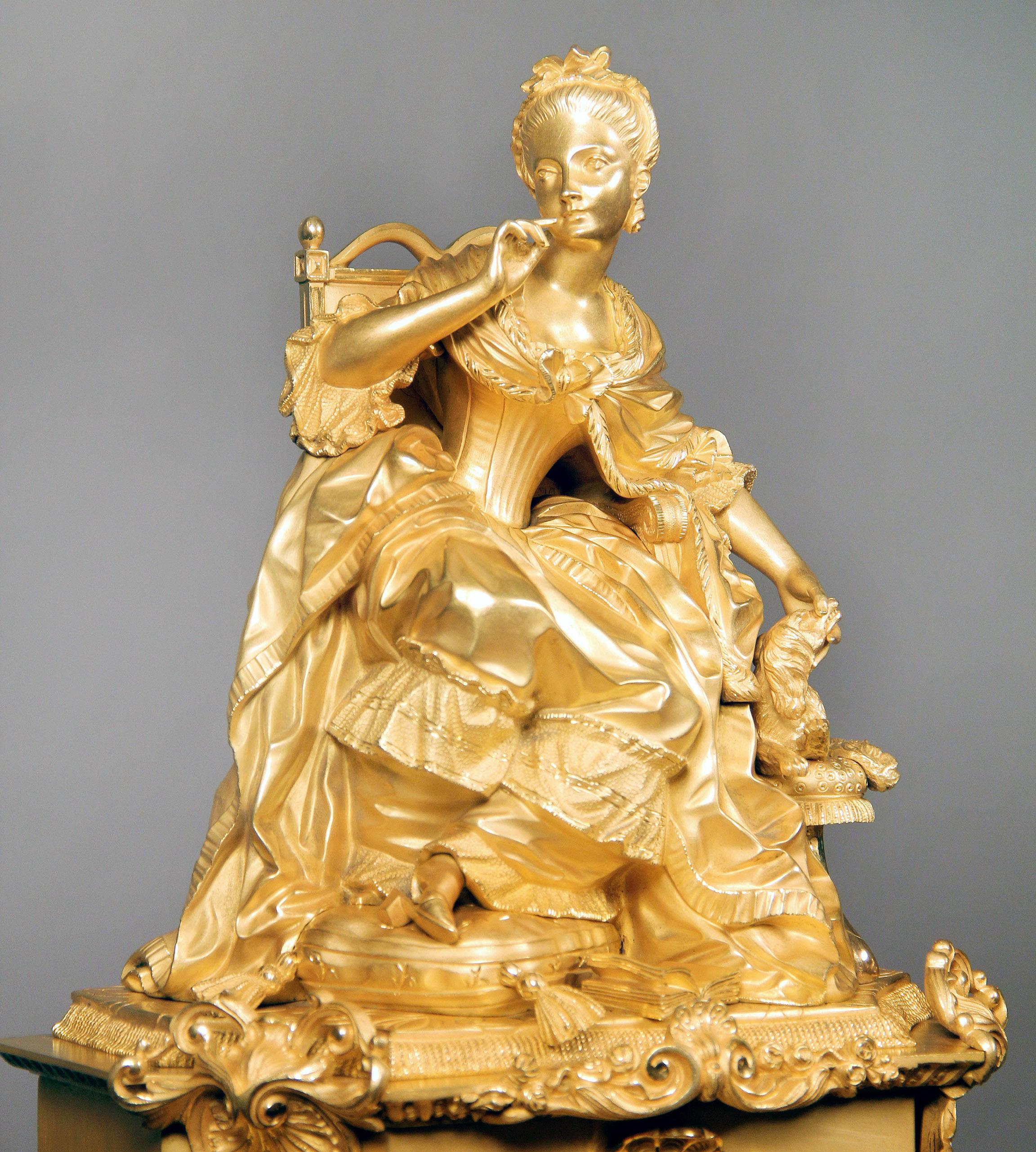 An outstanding late 19th century gilt bronze mantel (fireplace) clock by Dagrin and Philippe

By Dagrin and Philippe

A large gilt bronze, beautifully dressed sculpture of Marie Antoinette sitting with her dog on top of an intricately designed