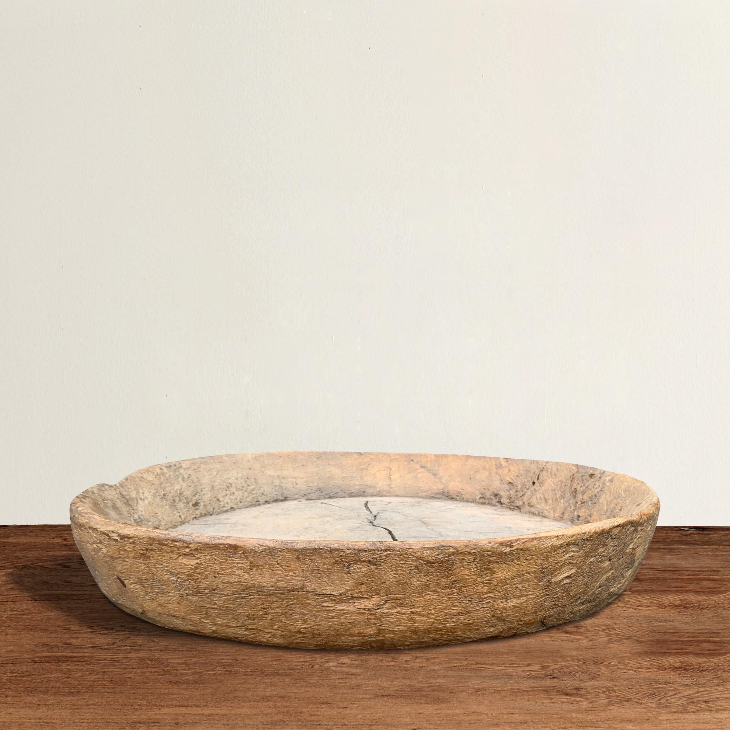 An outstanding massive 18th century, or earlier, English carved sycamore wood bowl with straight sides and a beautiful patina only two hundred years of wear could bestow. What a fantastic fruit bowl, or use just inside your front door to catch all