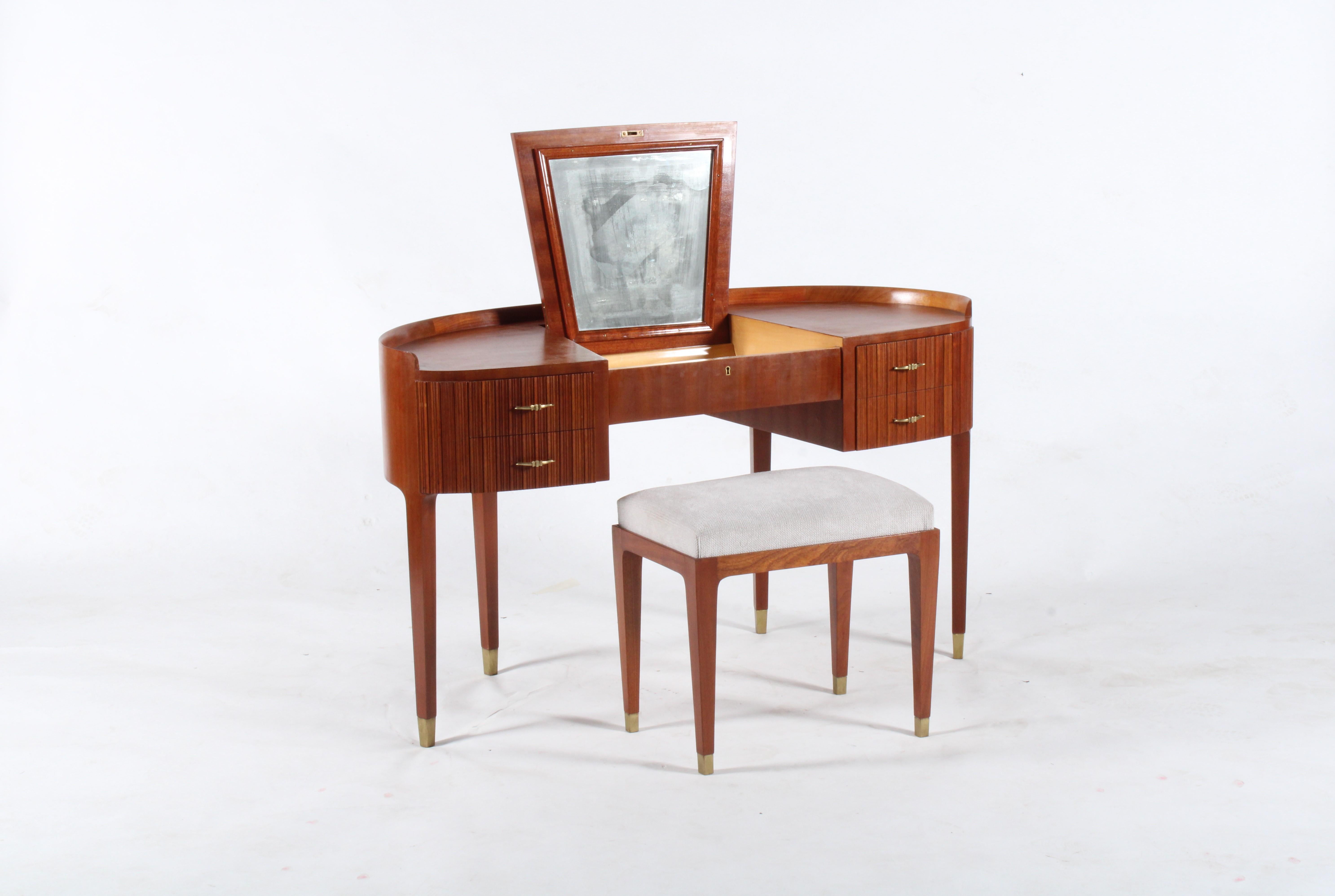 One of the highlights of the Acquired collection this outstanding dressing table by world renowned Italian designer Paola Buffa is one of the finest examples available anywhere in the world. Constructed in a beautiful mahogany with maple interior it