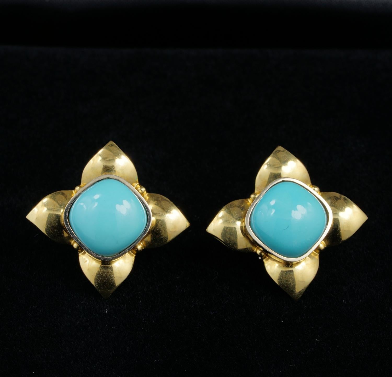 Dress Up!

Charm and style is here all
Smashing pair of 1970 ca natural Persian Turquoise cabochon earrings , beautifully polished and cushion cut to fit the gorgeous and very stylish almost clover work rendered in rich 18 KT gold
Very fine Italian
