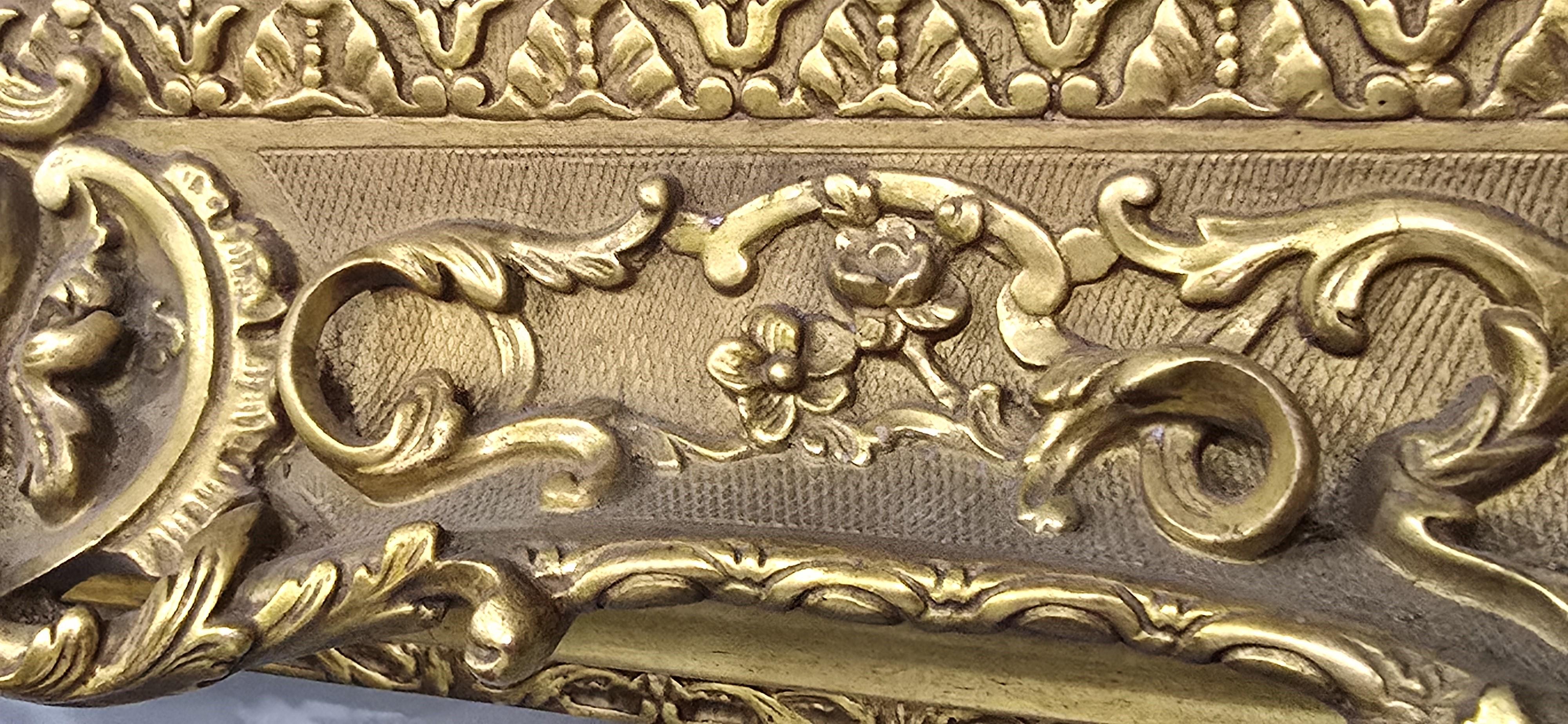 Excepcional pareja de espejos dorados siglo XX en venta