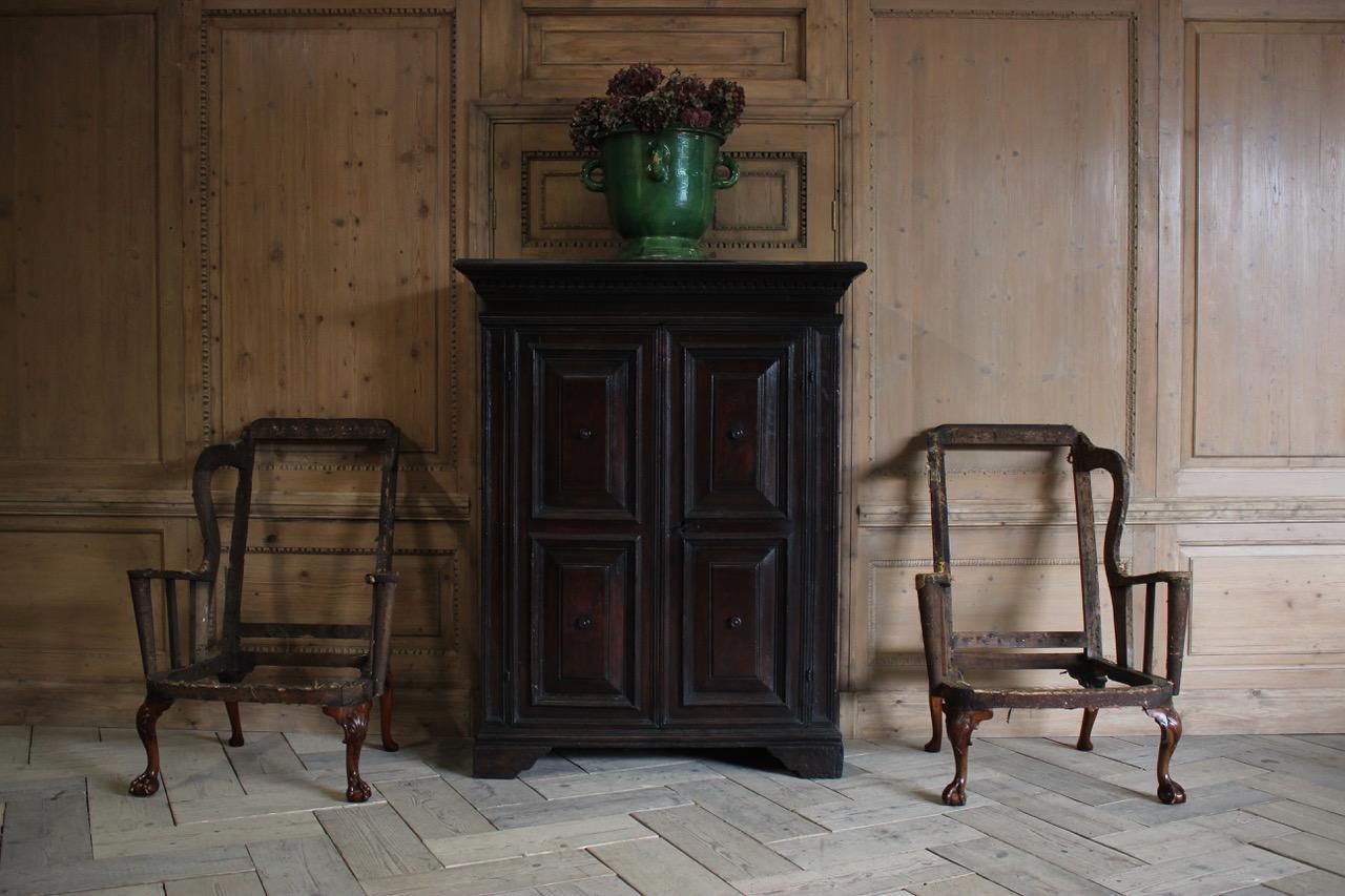 A wonderful pair of early 18th century French period walnut cupboards with great proportions and a lovely color, that will make a statement in most settings. It is very unusual to get a pair of period cupboards of this age and with this size.