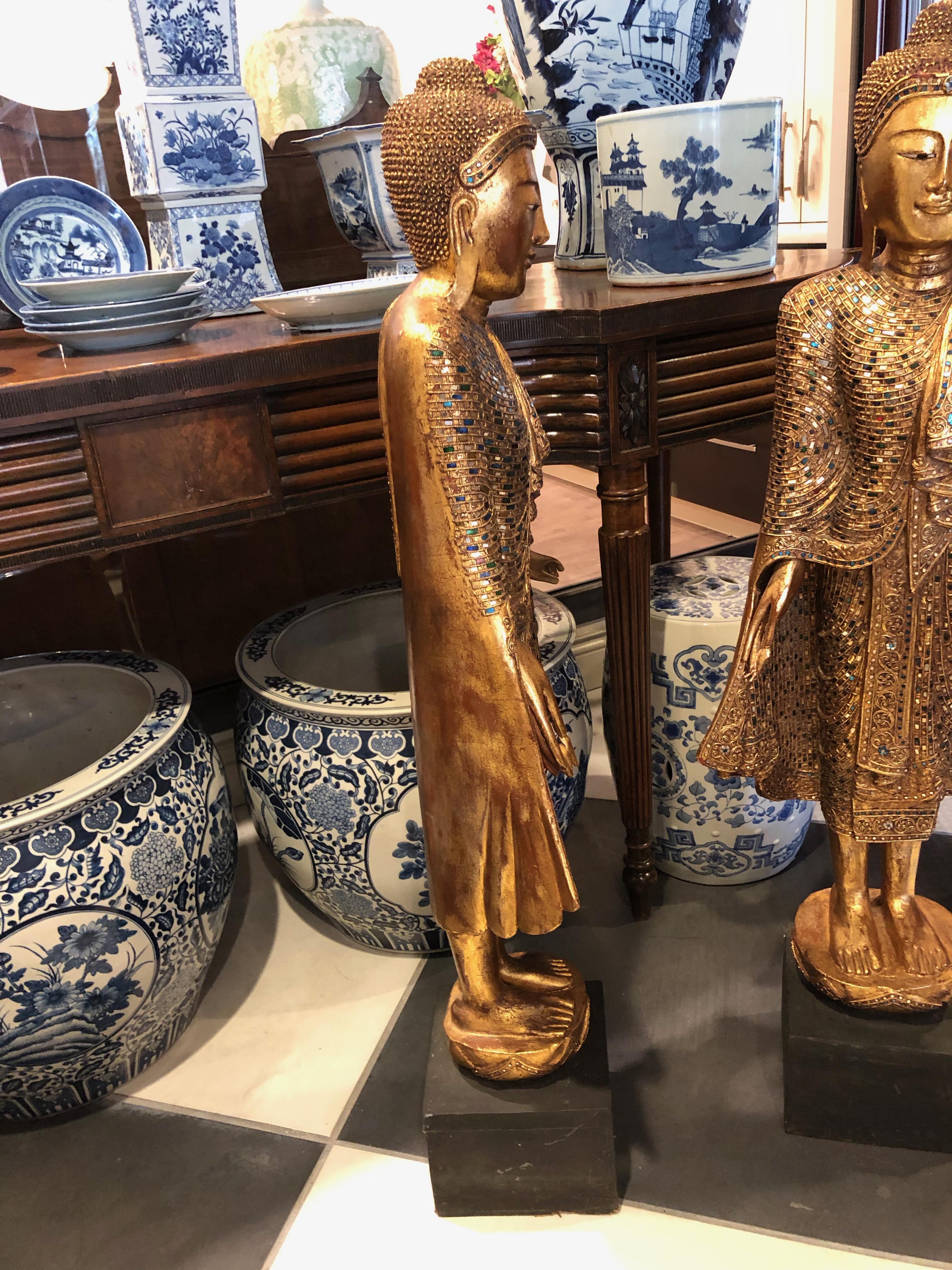 Mid-20th Century Pair of Gold Leafed Standing Thai Buddhas Statues
