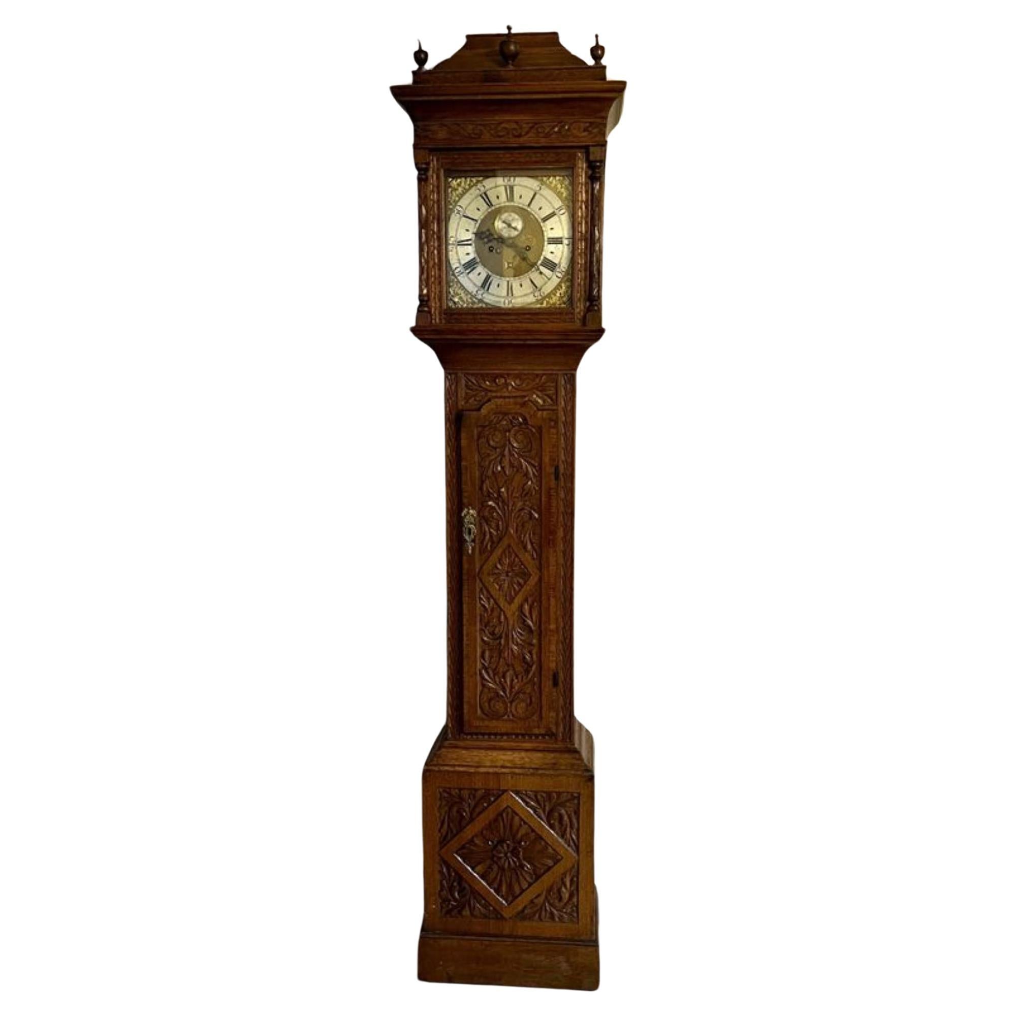 Outstanding quality 18th century carved oak long case clock