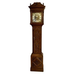 Outstanding quality 18th century carved oak long case clock