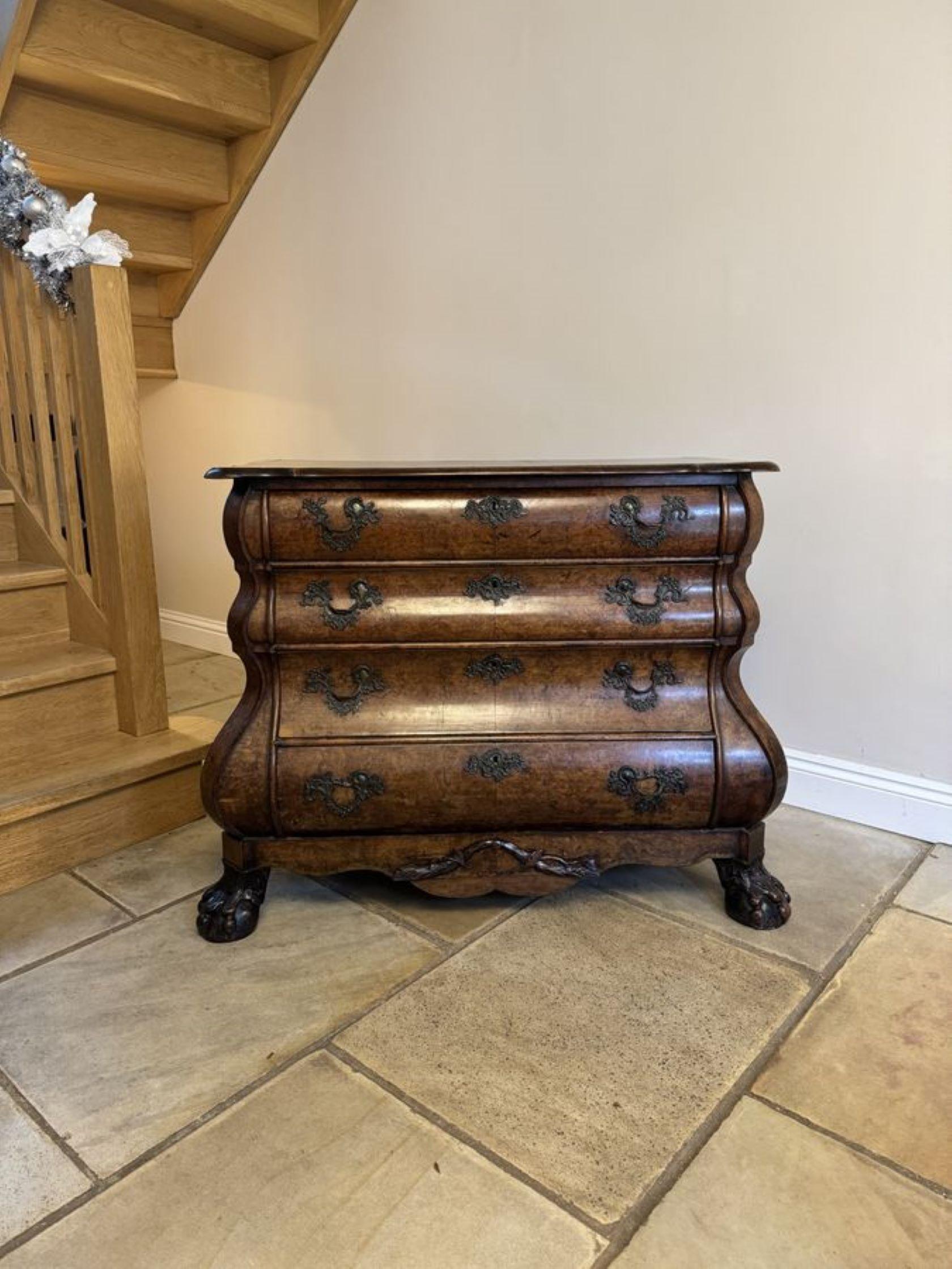 Outstanding quality 18th century Dutch antique burr walnut bombe chest of drawers, having a quality burr walnut shaped top with a moulded edge above four bombe shaped burr walnut drawers with the original ornate brass handles, standing on carved