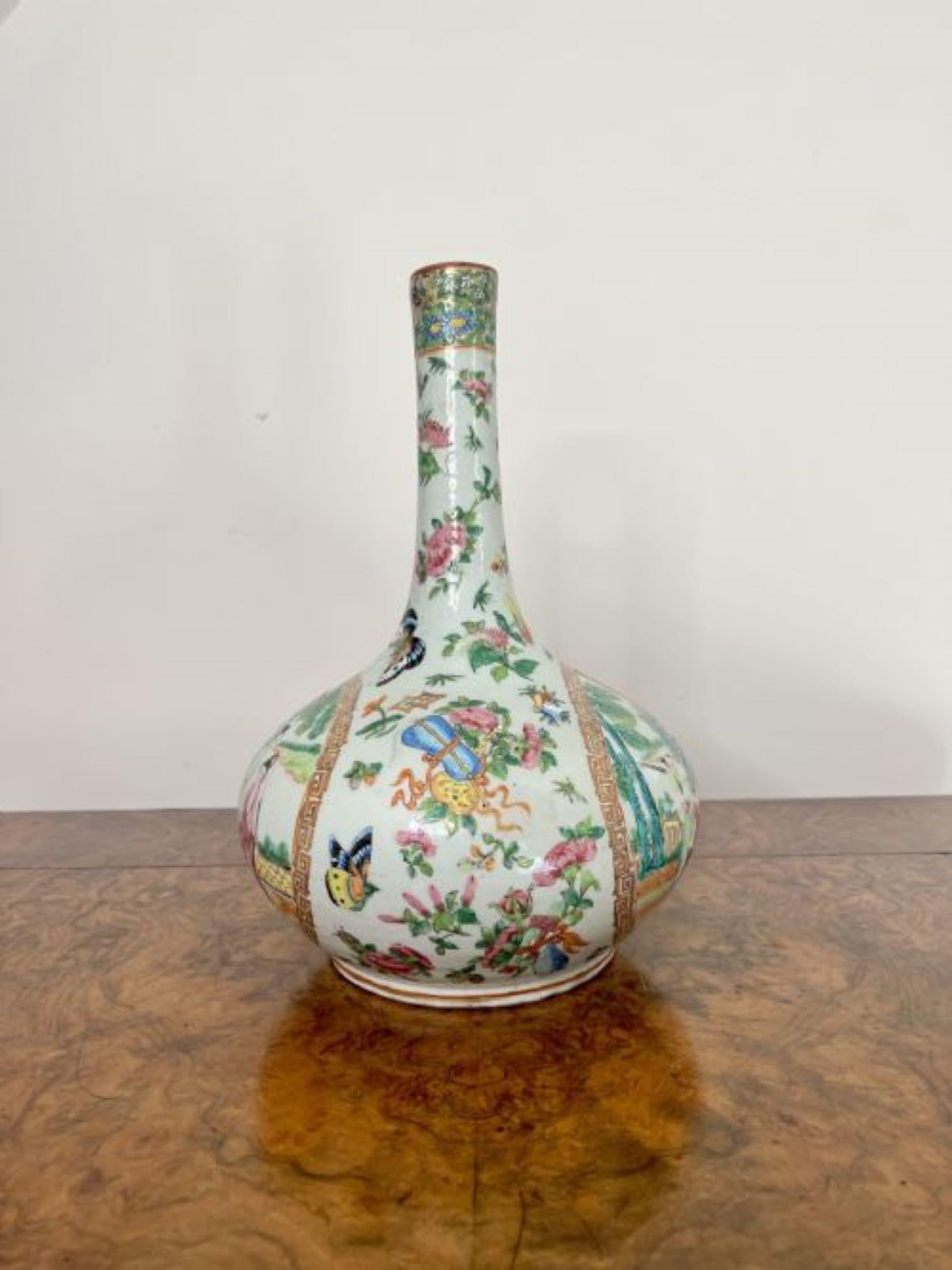 Outstanding quality 19th century large Chinese famille rose vase decorated with two large panels showing numerous figures in traditional clothing within a court setting, profusely and beautifully detailed with birds, butterflies, flowers and fruit