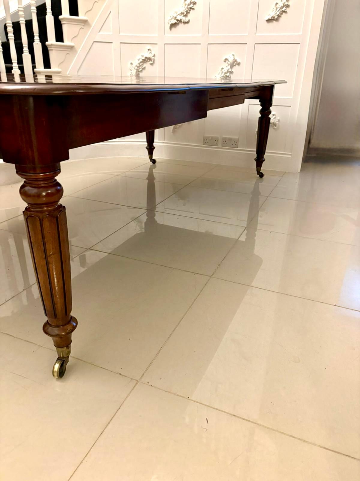 English Outstanding Quality Antique 12 Seater Figured Mahogany Extending Dining Table For Sale
