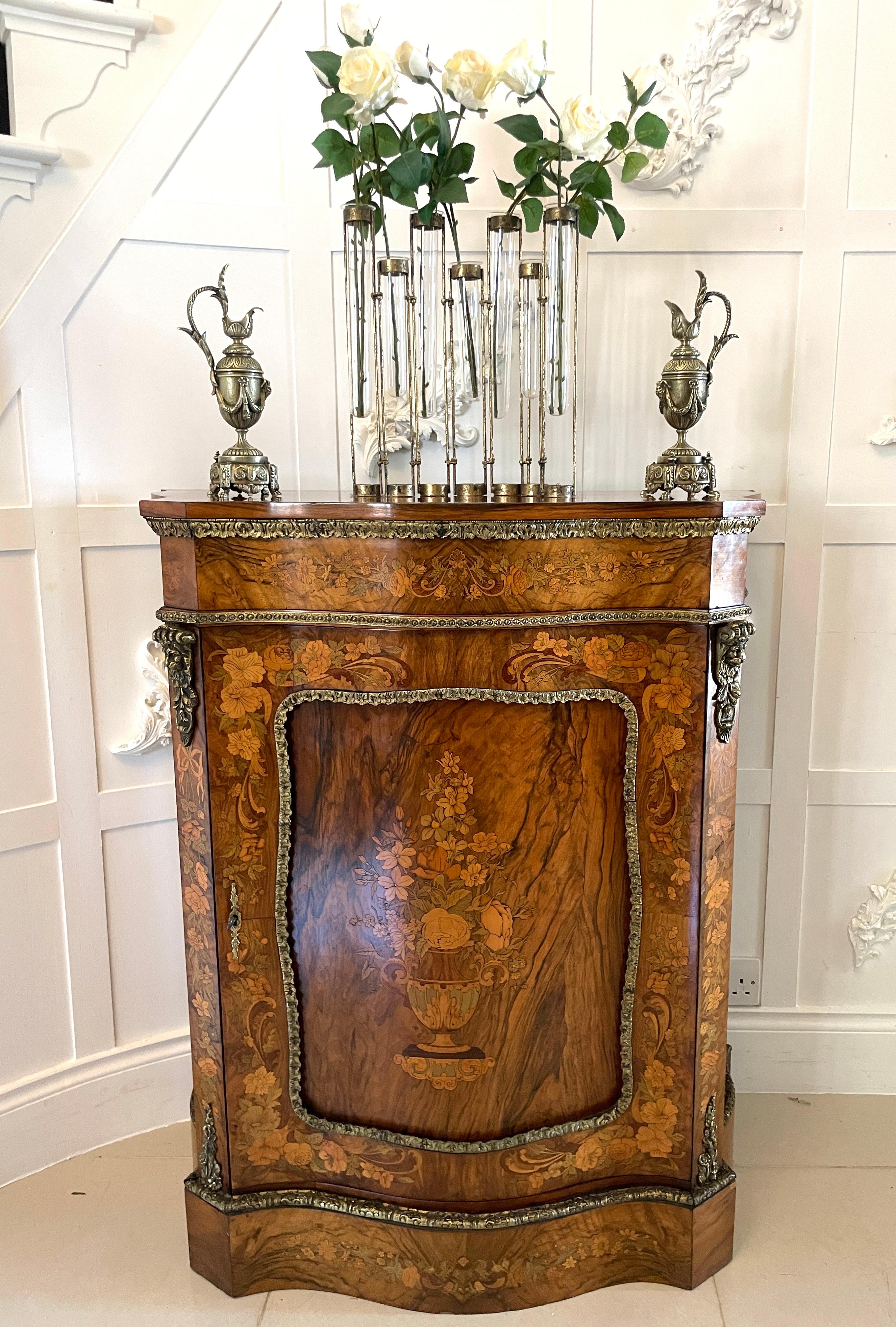 Outstanding quality antique Victorian burr walnut inlaid floral marquetry side cabinet having a serpentine shaped burr walnut top above an inlaid floral marquetry serpentine shaped frieze above a serpentine shaped burr walnut door with outstanding
