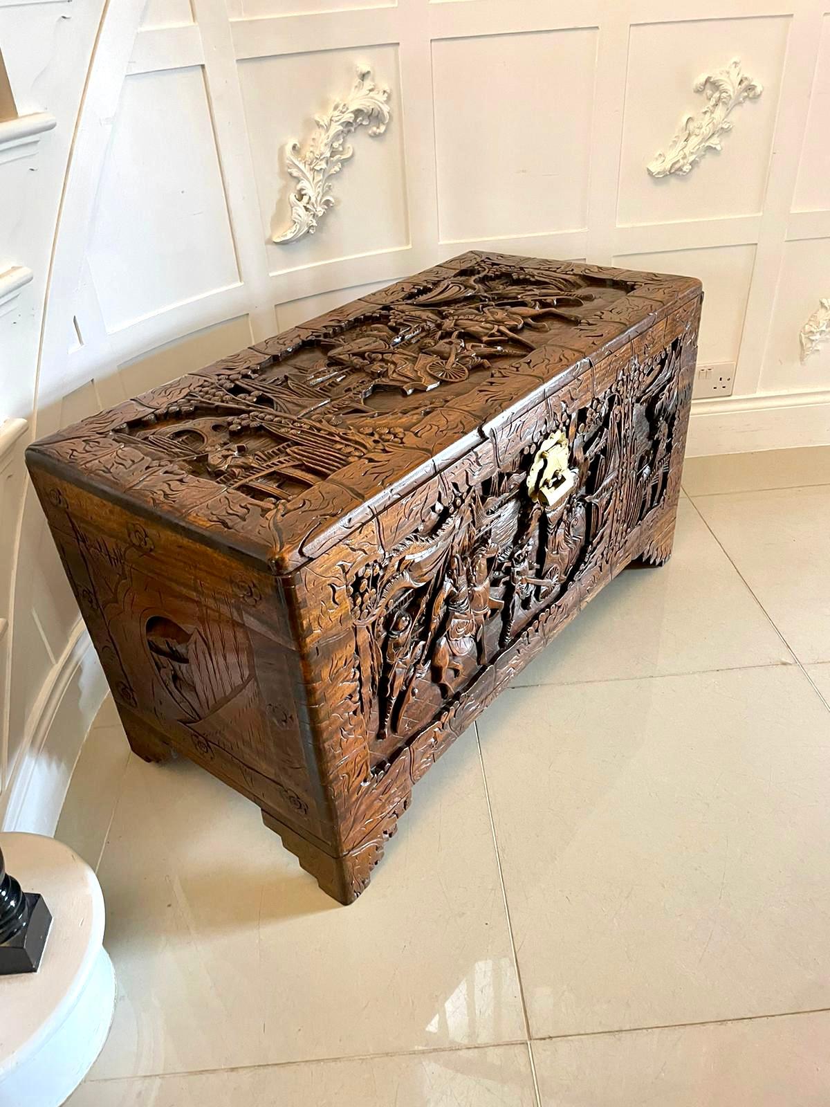 Outstanding quality antique Chinese carved camphor wood freestanding chest having outstanding quality carved panels on all sides, lift up lid with original brass lock and key opening to reveal a large storage compartment 


Beautifully carved and