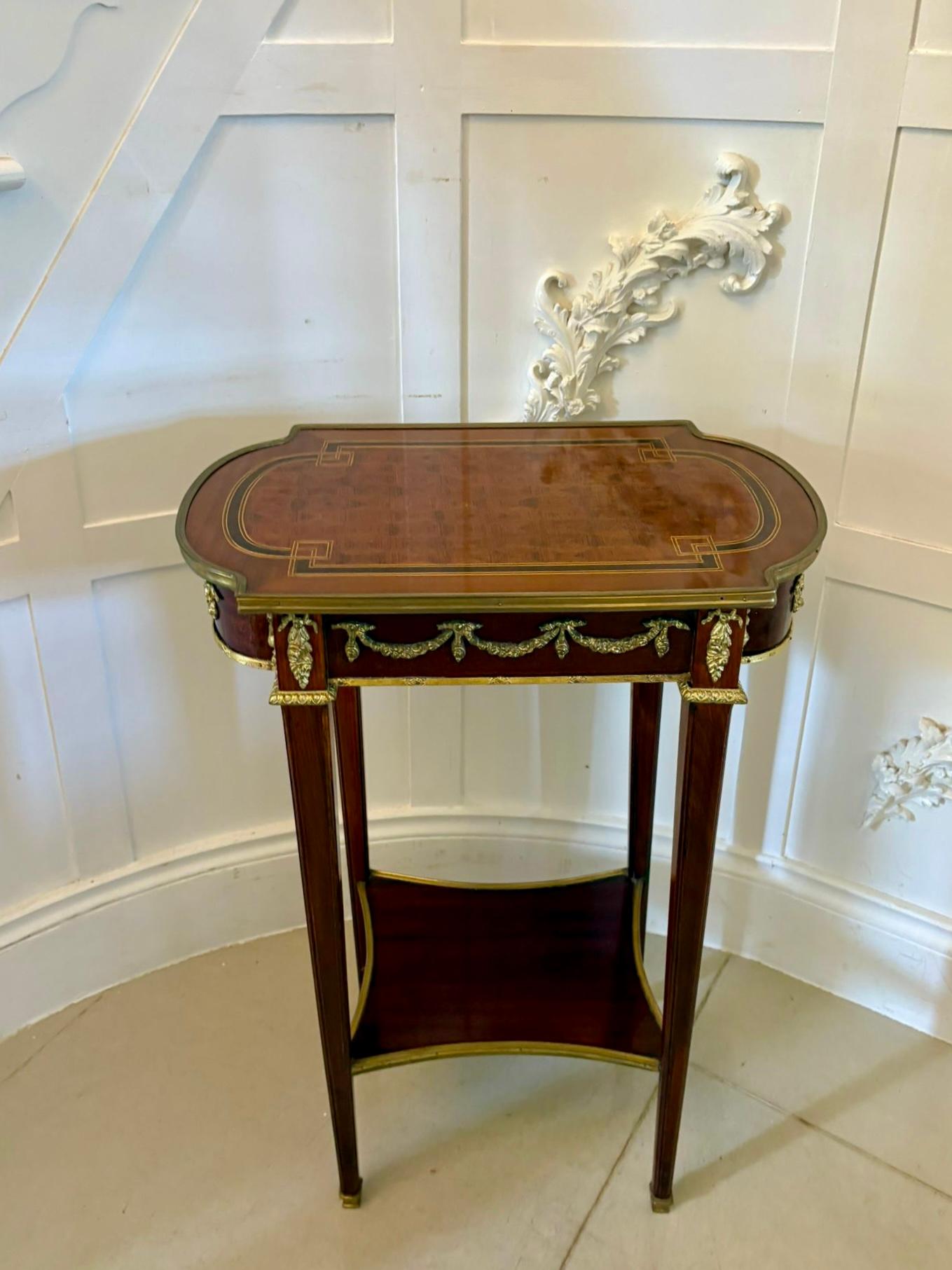 Outstanding quality antique Edwardian mahogany and ormolu mounted lamp table having a fabulous quality inlaid mahogany top above an ornate ormolu mounted frieze with a single drawer standing on square tapering legs with ormolu mounted feet united by