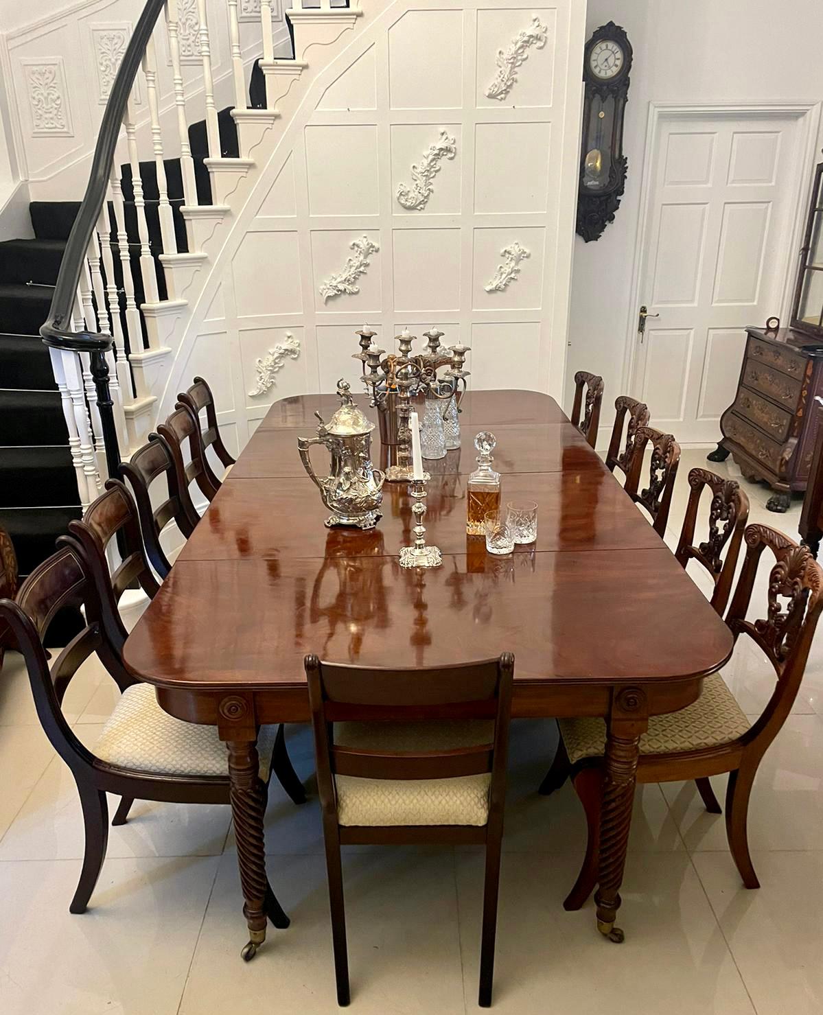Outstanding quality antique Regency figured mahogany metamorphic extending dining table having an outstanding quality figured mahogany top with two original extra leaves with a reeded edge, unusual extending concertina action mahogany frieze
