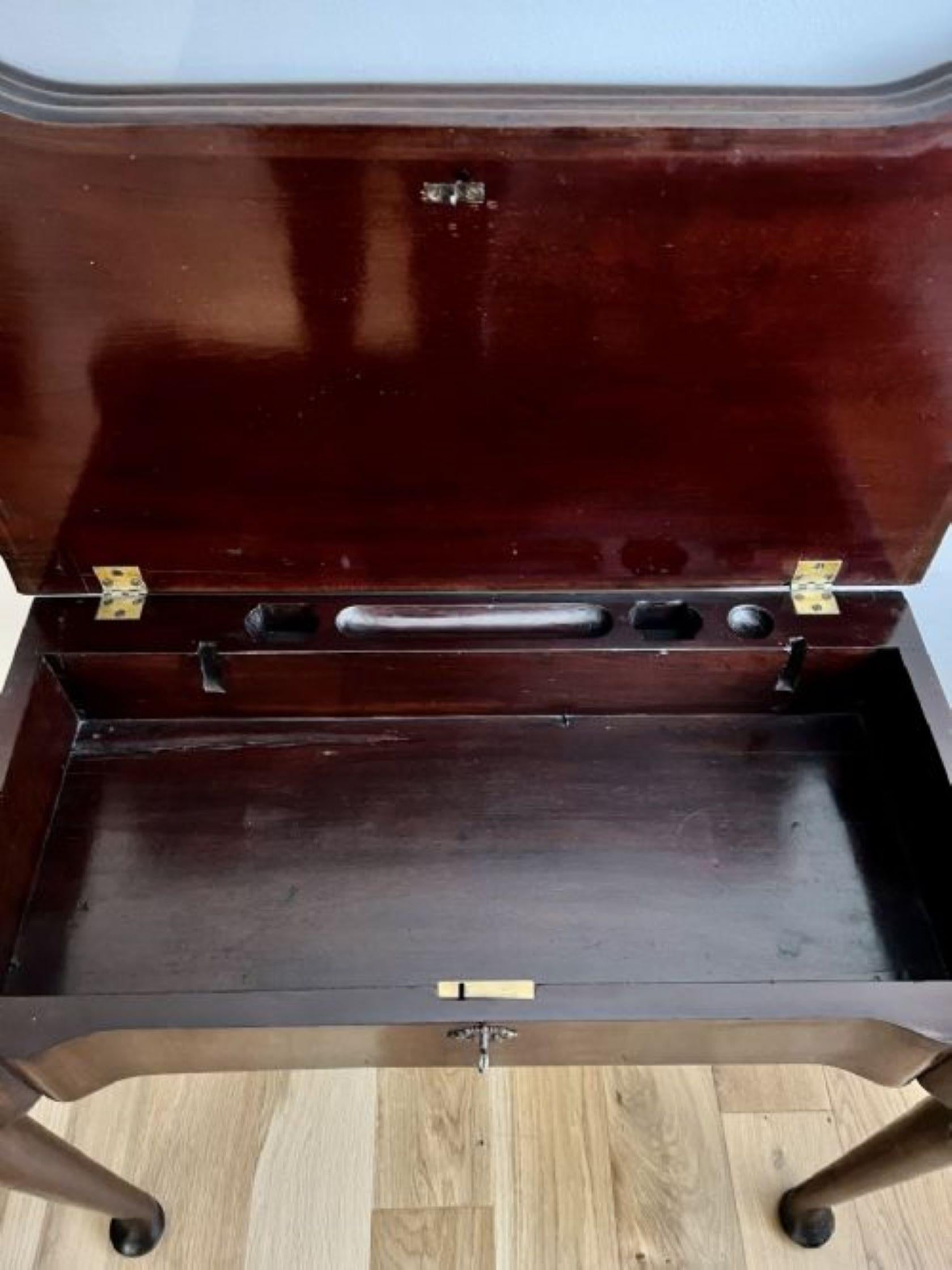 Outstanding quality antique George III mahogany games table having a quality treble mahogany fold over shaped top opening to reveal a backgammon games board, opening again to reveal a green baize interior with mahogany wells and opening again to