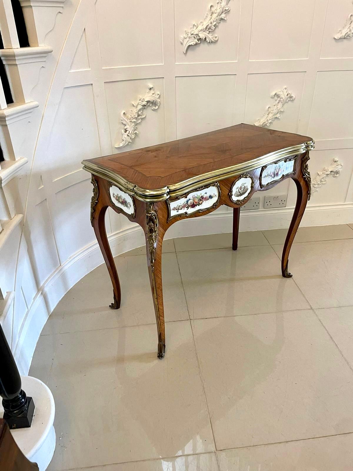 Outstanding quality Antique Victorian porcelain and ormolu mounted kingwood card/console table by G T Morant, Bond Street, London having a beautiful serpentine shaped kingwood crossbanded swizzle top with a brass edge opening to reveal a baize