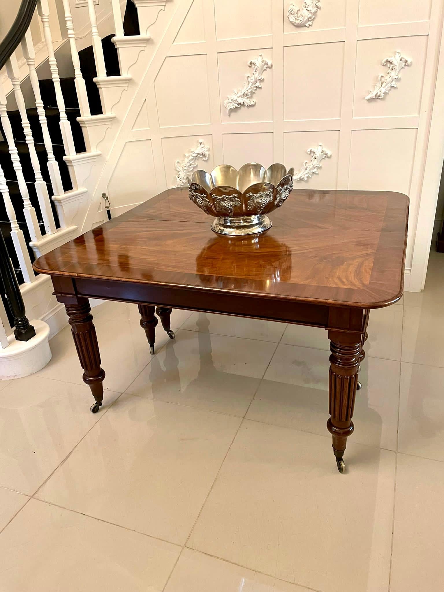 Outstanding quality antique regency figured mahogany extending dining table 
Having an outstanding quality figured mahogany crossbanded top with a moulded edge, two original crossbanded figured mahogany extra leaves, pull out extending action,