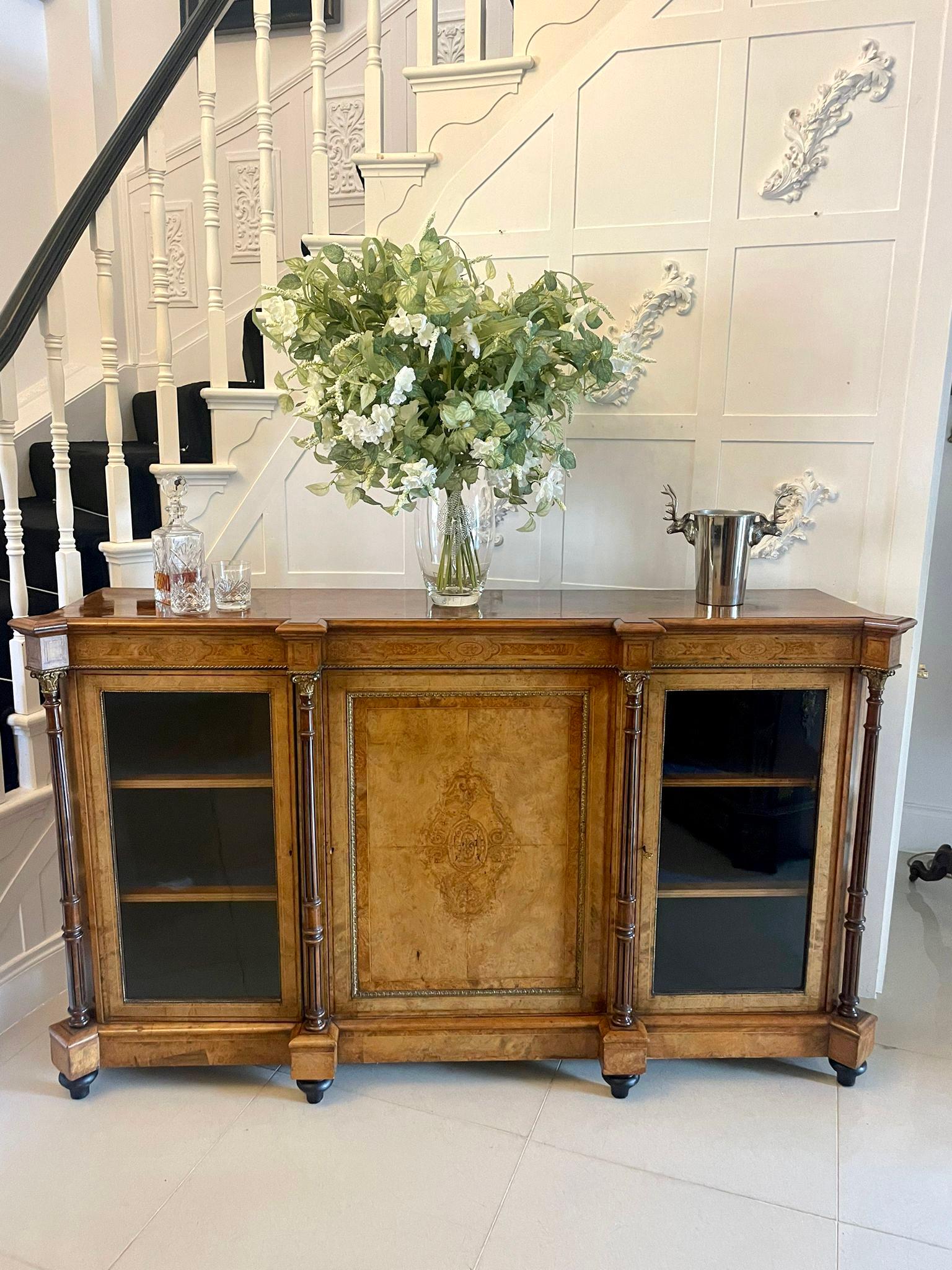 Outstanding quality antique Victorian burr walnut inlaid credenza having an outstanding quality burr walnut top above a quality burr walnut inlaid frieze, one large burr walnut door to the centre with ornate ormolu and a fantastic inlaid panel
