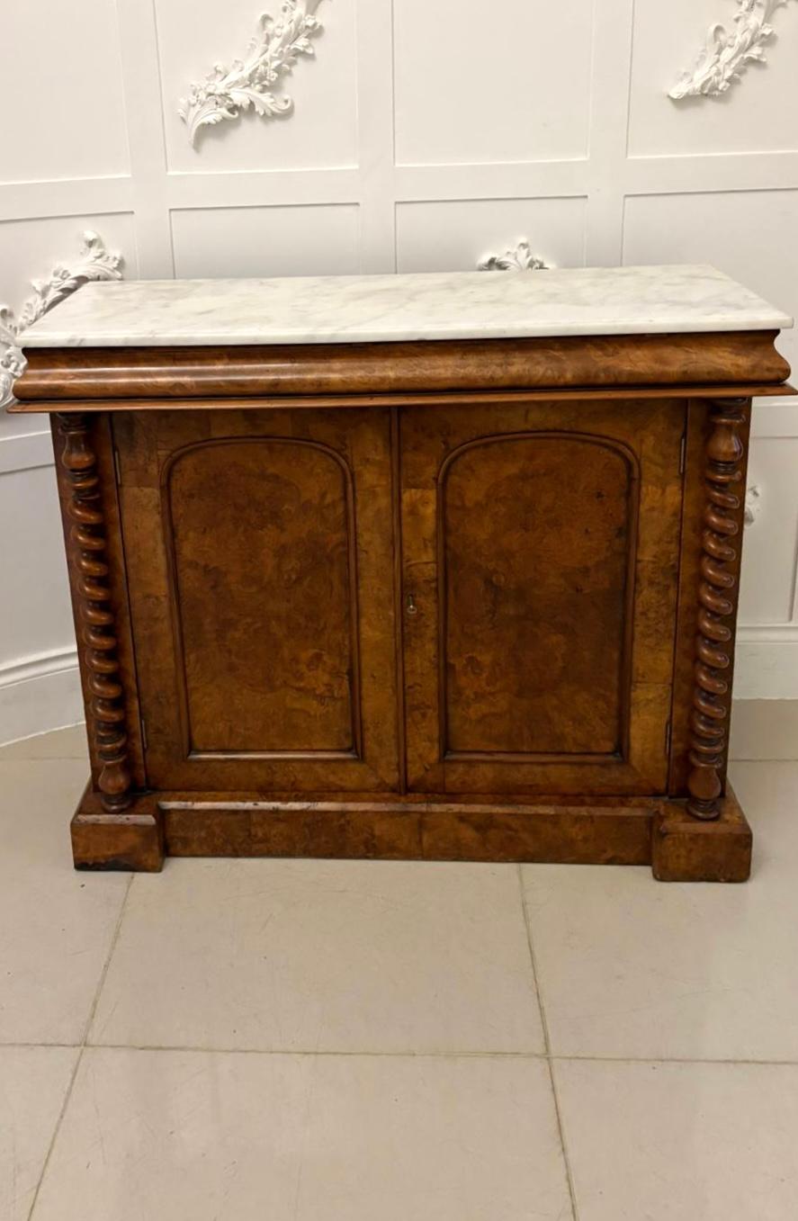 Outstanding quality antique Victorian burr walnut marble top sideboard/cabinet having the original white marble top above a burr walnut shaped frieze above a pair of outstanding quality burr walnut panelled doors, original key opening to reveal a