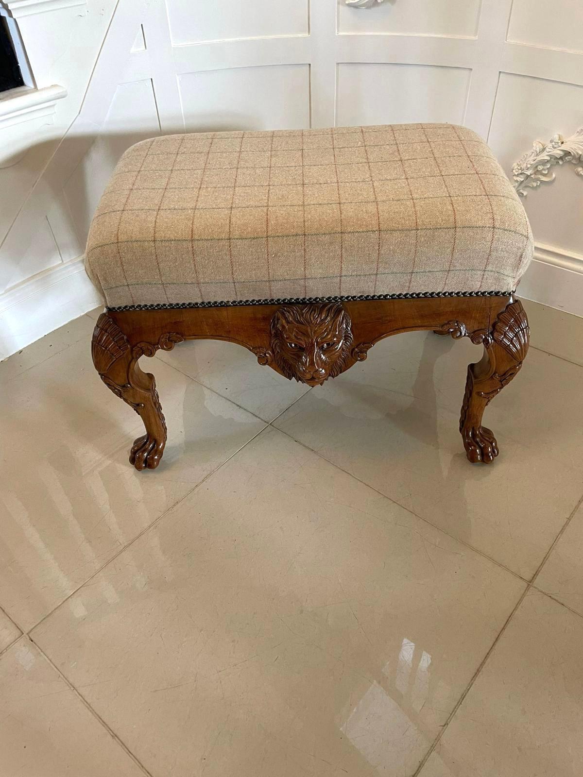 Outstanding quality antique Victorian carved walnut freestanding stool having a newly reupholstered seat in a quality fabric above an outstanding quality carved walnut freestanding 
stool standing on shaped solid walnut cabriole legs with claw feet