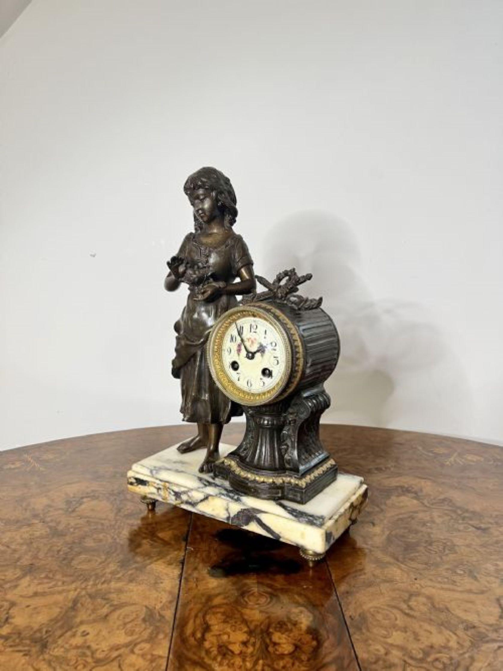 Outstanding quality antique Victorian clock garniture, with spelter figure decoration having a figure of a girl holding a birds nest, and two decorated side urns, having a circular porcelain floral dial with Arabic numerals, the original hands and