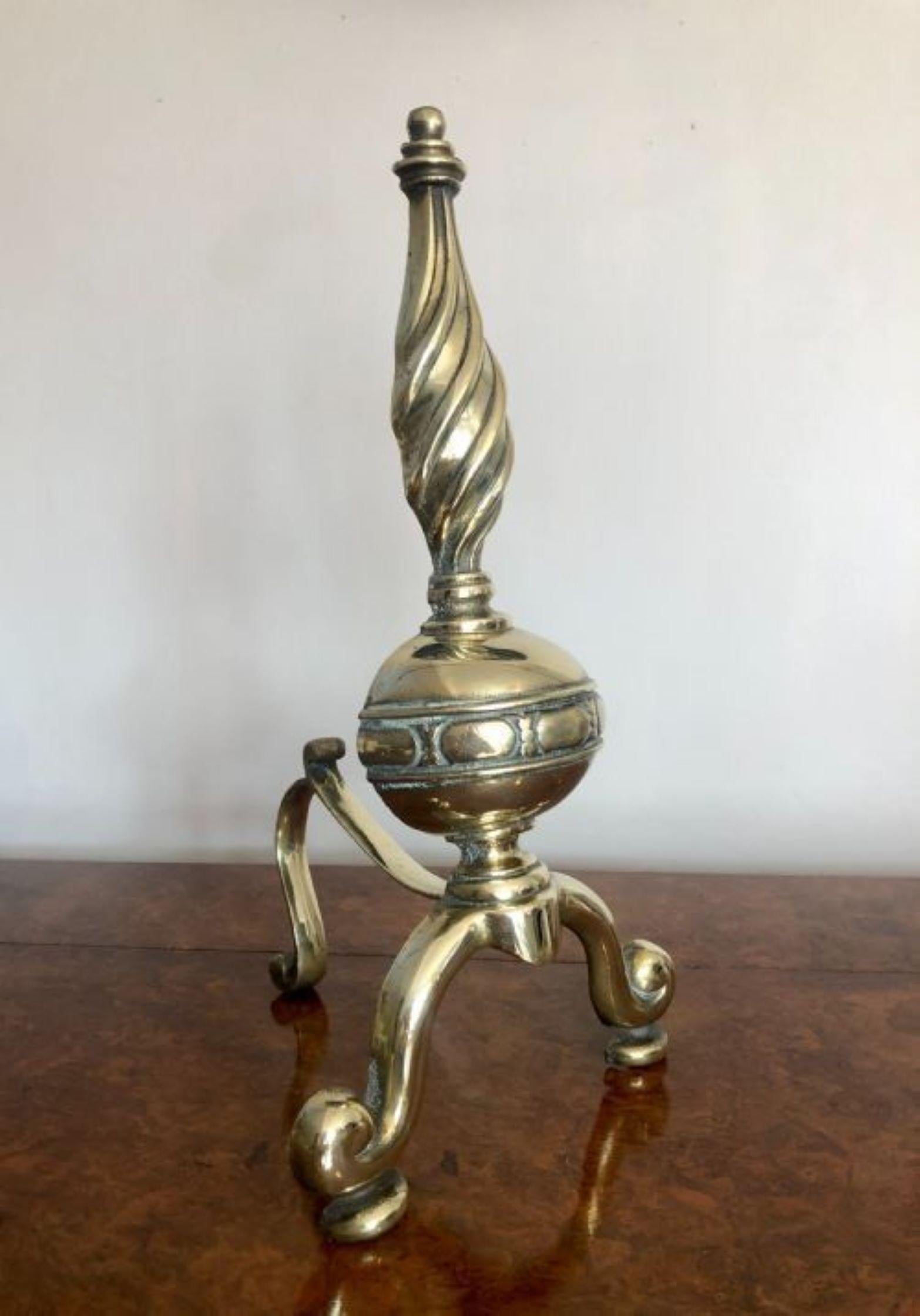 Outstanding quality antique Victorian brass fire dogs, having a rope twist shape top above a round ornate ball standing on shaped cabriole legs with scroll feet