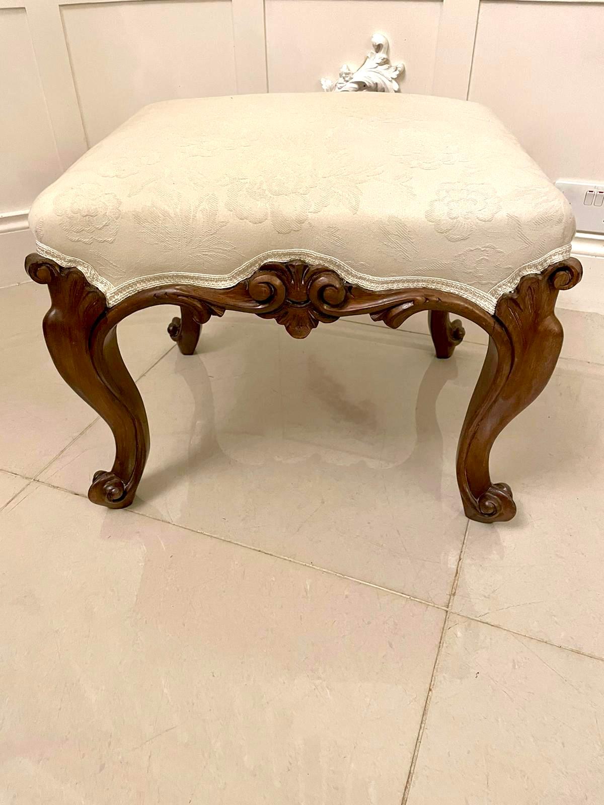 Outstanding quality antique Victorian freestanding carved walnut stool having a newly reupholstered seat in a quality fabric above an outstanding quality carved walnut frieze standing on four shaped carved solid walnut cabriole legs with scroll