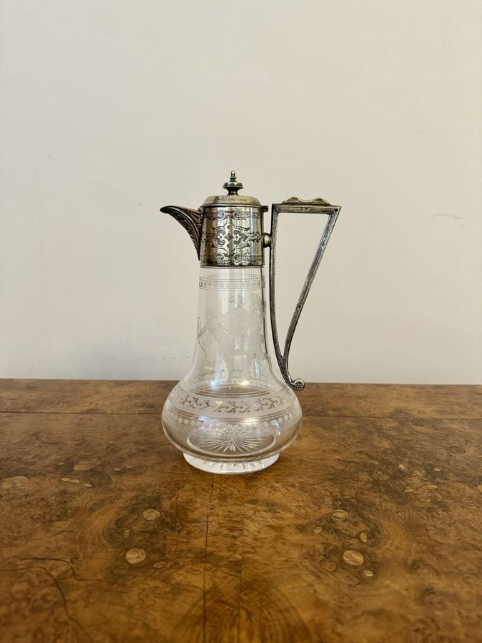 Outstanding quality antique Victorian silver plated claret jug by John Northwood, after John Flaxman, having a Victorian Etruscan Revival etched glass and silver plate mounted claret jug, having a bulbous shaped body engraved with images from