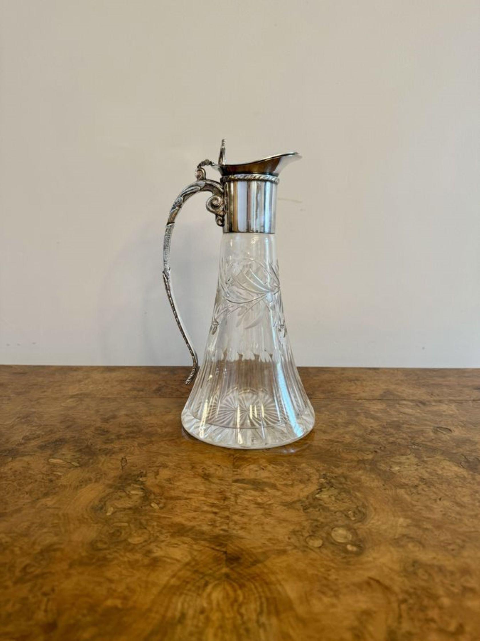 Outstanding quality antique Victorian silver plated claret jug having a quality antique Victorian silver plated claret jug, with a silver plated top with a lift up lid, a shaped spout and an ornate silver plated shaped handle to the back, fantastic