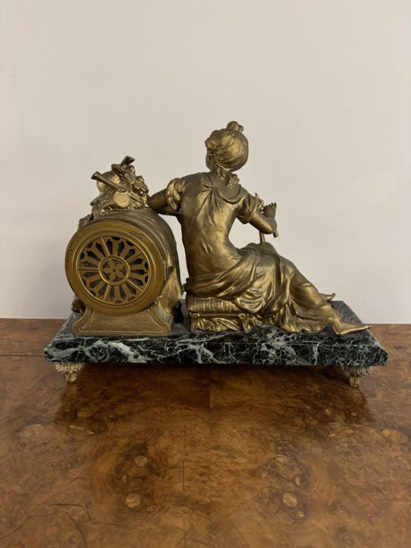 Outstanding quality antique Victorian spelter figure mantle clock, having a quality 19th century gilt spelter figure mantel clock, with a seated lady to the side of the enamelled dial with Roman numerals and the original hands, raised on a