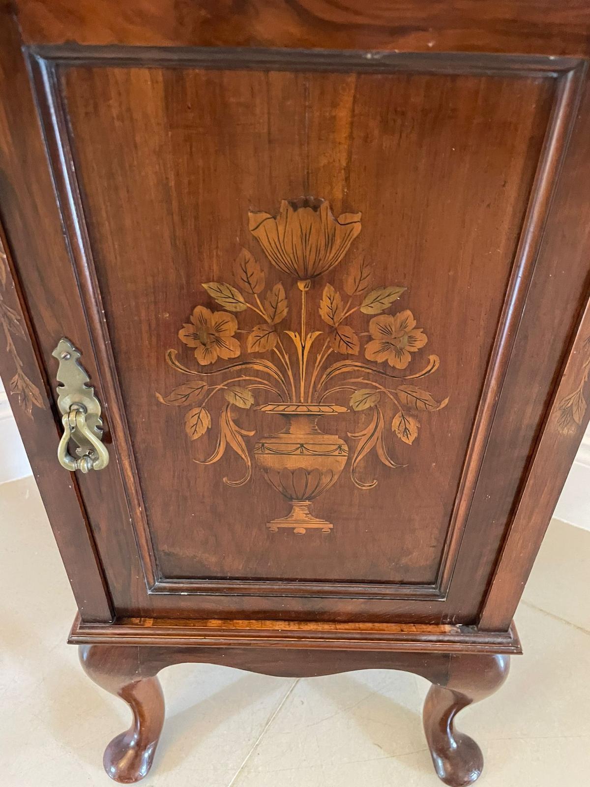 Outstanding quality antique Victorian figured walnut floral marquetry inlaid bedside cabinet 
having a figured walnut top above a single figured walnut outstanding quality floral marquetry inlaid panelled door with original brass handle opening to