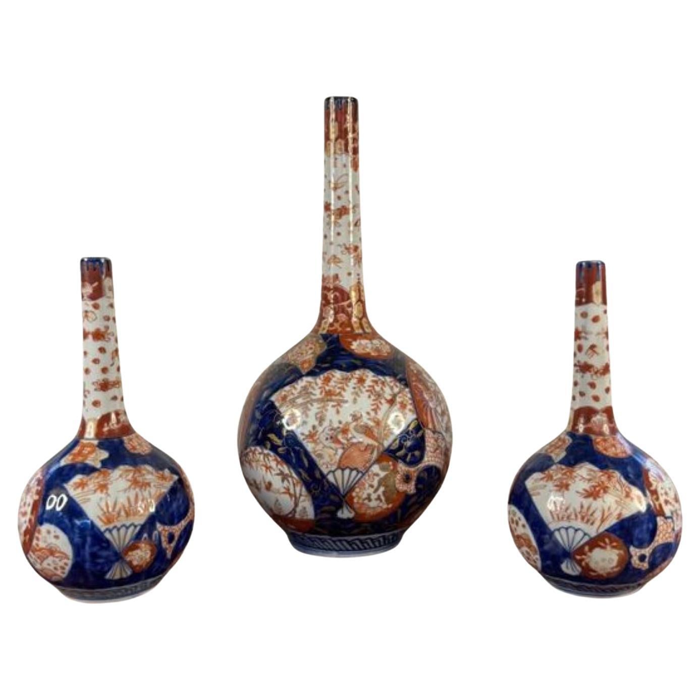 Outstanding quality garniture of three Japanese imari shaped vases