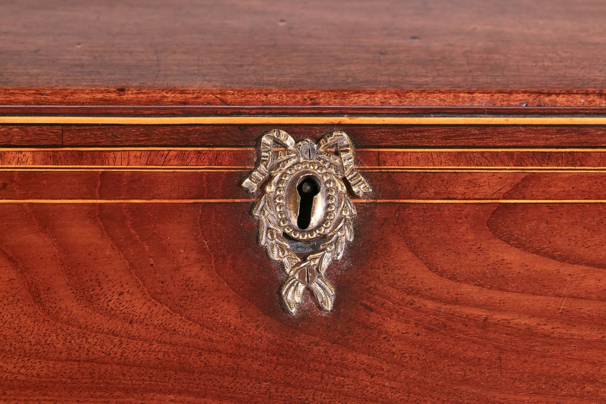 Outstanding quality George III inlaid mahogany bureau, having two short drawers and three long drawers with original brass handles, the inlaid mahogany fall opens to reveal a fantastic fitted satinwood interior, standing on original ogee shaped