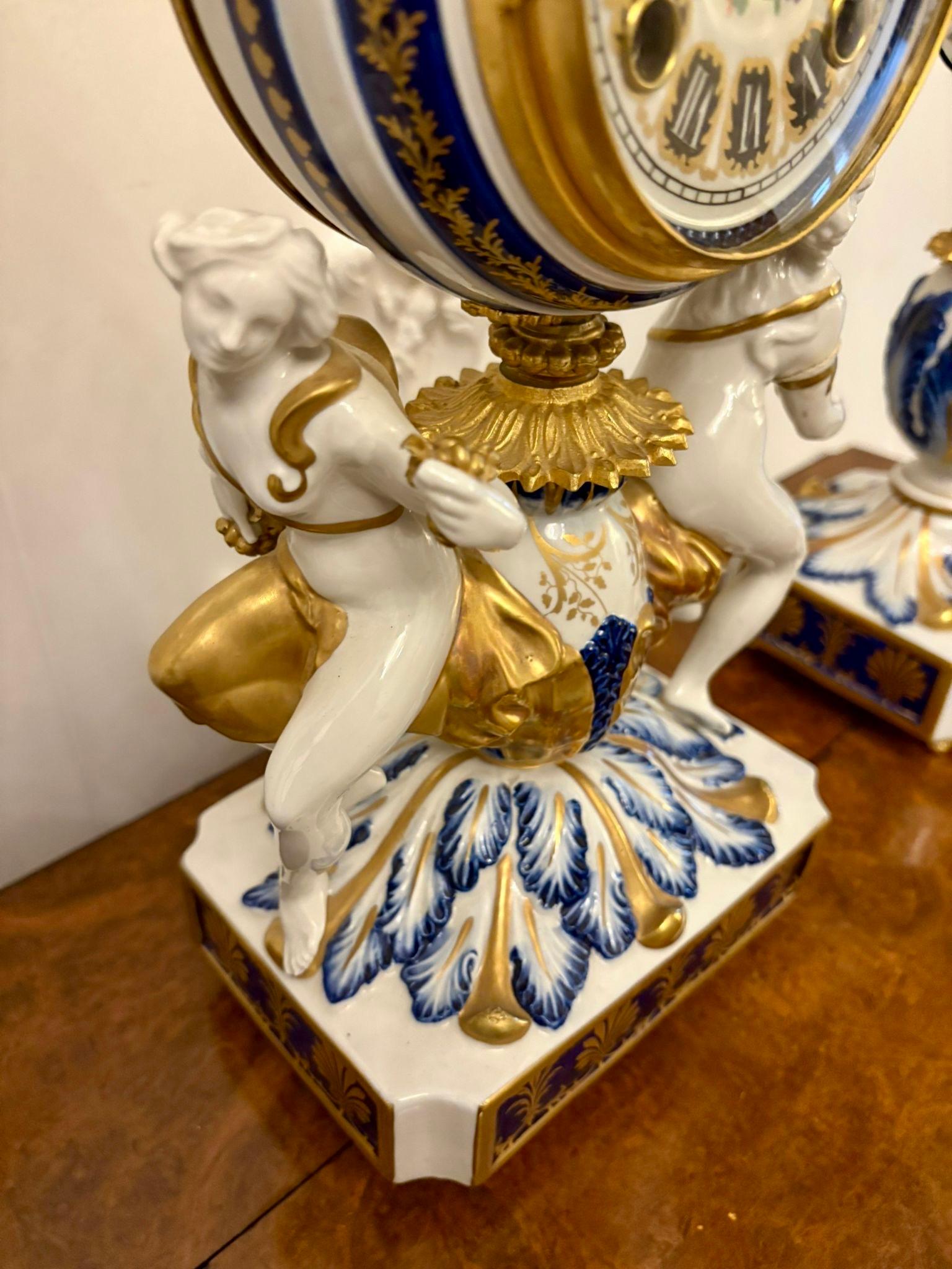 Victorian Outstanding Quality Large Antique French Porcelain and Gilded Metal Clock Set For Sale