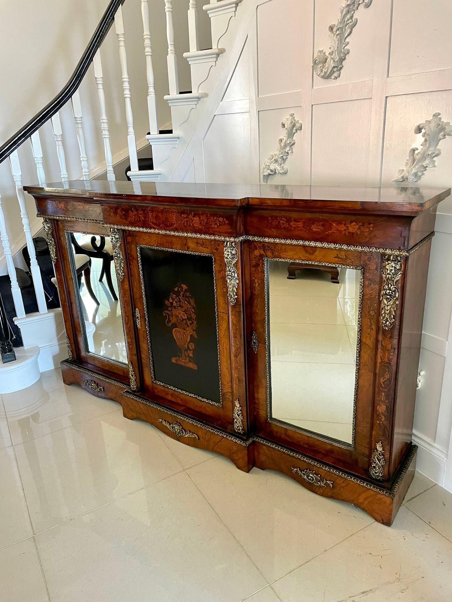 Outstanding quality large antique Victorian inlaid floral marquetry burr walnut ormolu mounted credenza having a quality burr walnut breakfront top above a pretty inlaid floral marquetry shaped frieze above three doors, the centre door having an