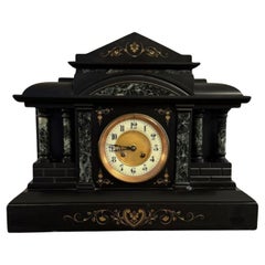 Orologio da camino antico di grande qualità