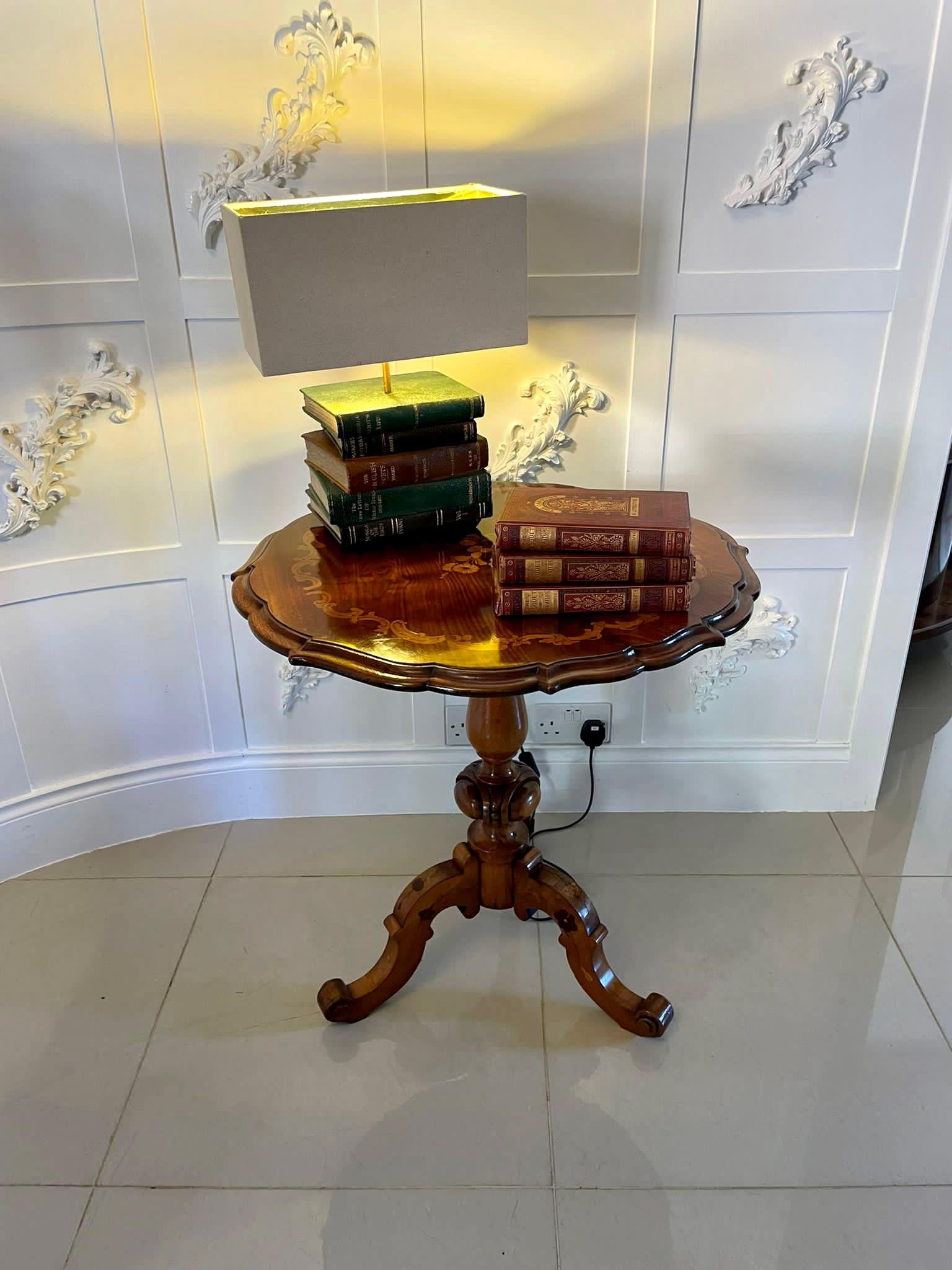 Outstanding quality large antique Victorian walnut marquetry inlaid lamp table having an outstanding quality burr walnut marquetry inlaid shaped top with a moulded edge supported by a shaped turned carved solid walnut column standing on three walnut