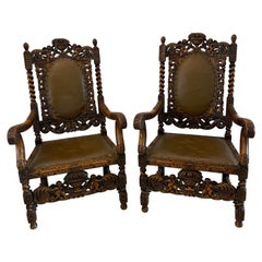 Outstanding Quality Large Pair of Antique Carved Walnut and Leather Armchairs Outstanding Quality Large Pair of Antique Carved Walnut and Leather Armchairs