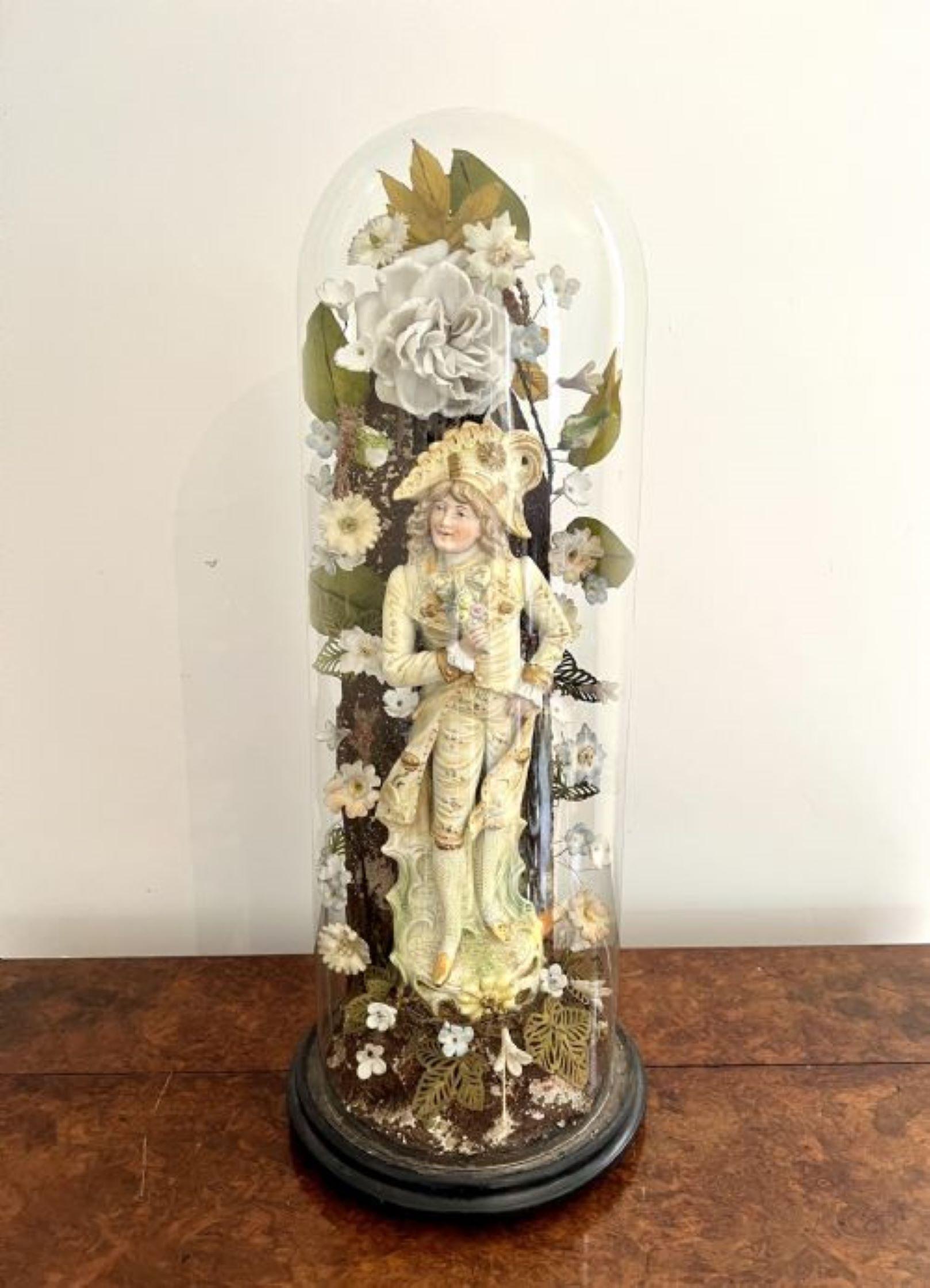 Outstanding quality pair of antique Victorian continental figures with the original glass domes having a quality pair of antique Victorian continental figures surrounded by decretive flowers and foliage in stunning blue, green, white and gold