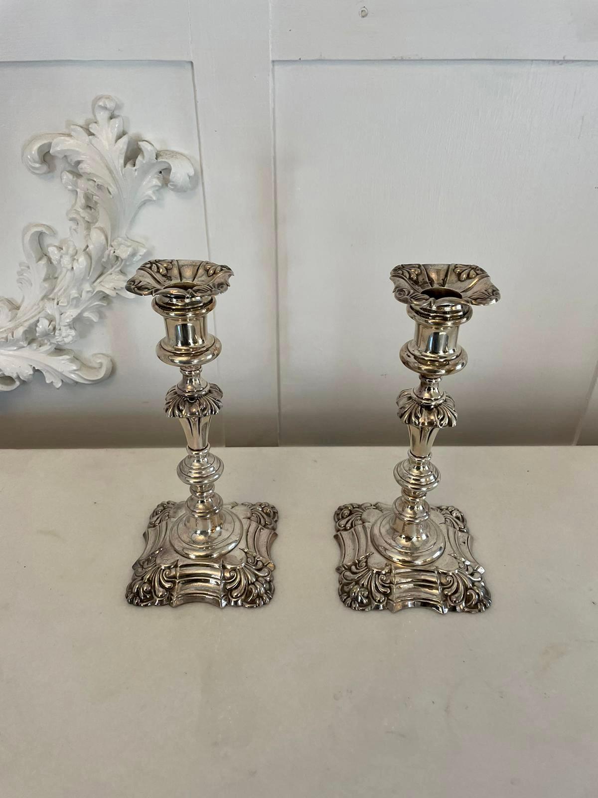 Outstanding quality pair of antique Victorian silver plated candlesticks having an outstanding quality pair of antique Victorian ornate silver plated candlesticks standing on ornate shaped stepped bases

A highly decorative pair in lovely