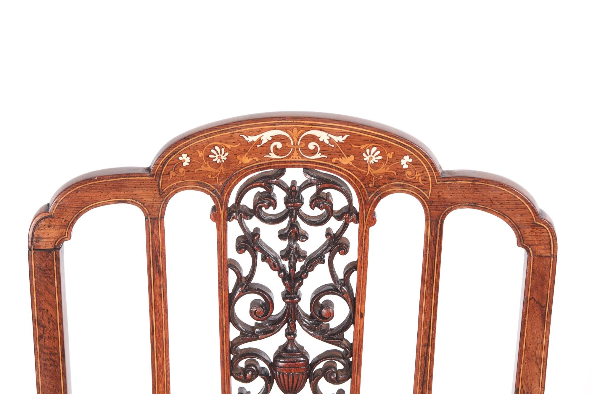 Outstanding quality pair of Edwardian inlaid hardwood side chairs with a stunning inlaid shaped top rail, beautiful carved centre splat, standing on square tapering legs with spade feet to the front and outswept back legs. Newly re-covered seats