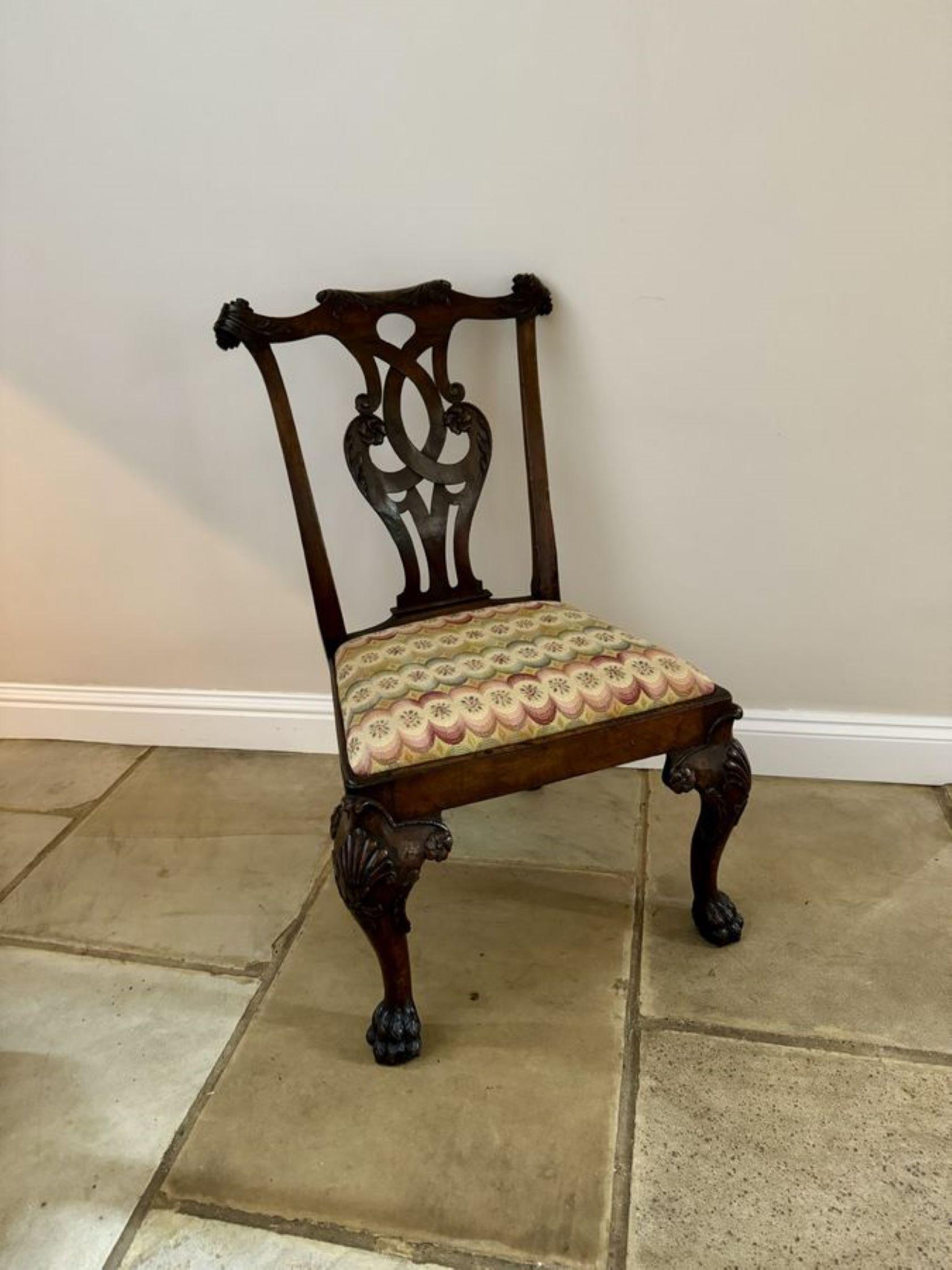 Outstanding quality set of eight antique Victorian mahogany Irish Chippendale style dining chairs, consisting of a pair of elbow chairs with shaped open arms and six single chairs. Having an outstanding quality carved mahogan Chippendale style back