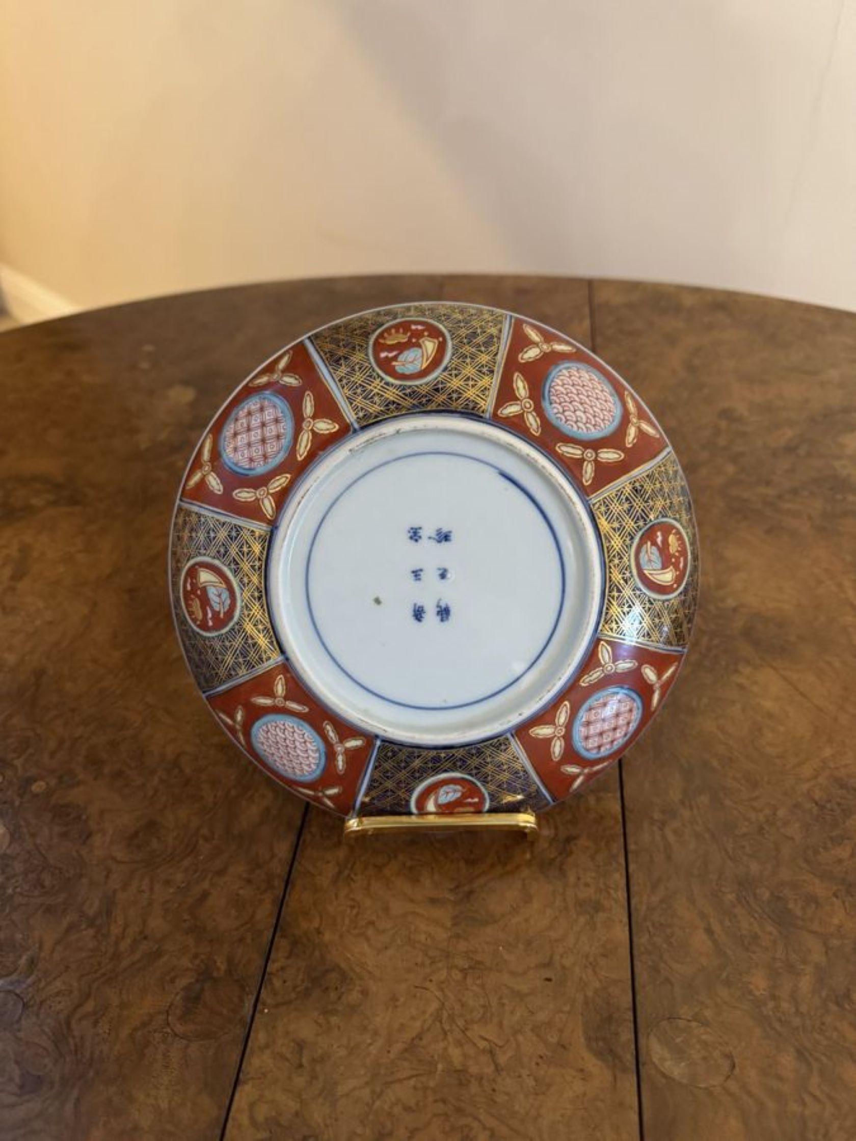 Outstanding rare collection of fourteen matching antique Japanese imari plates, having a fine quality collection of fourteen antique Japanese imari plates each with highly decorated panels and borders in vibrant red, blue, white and gold