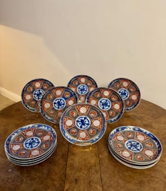 Outstanding rare collection of fourteen matching antique Japanese imari plates