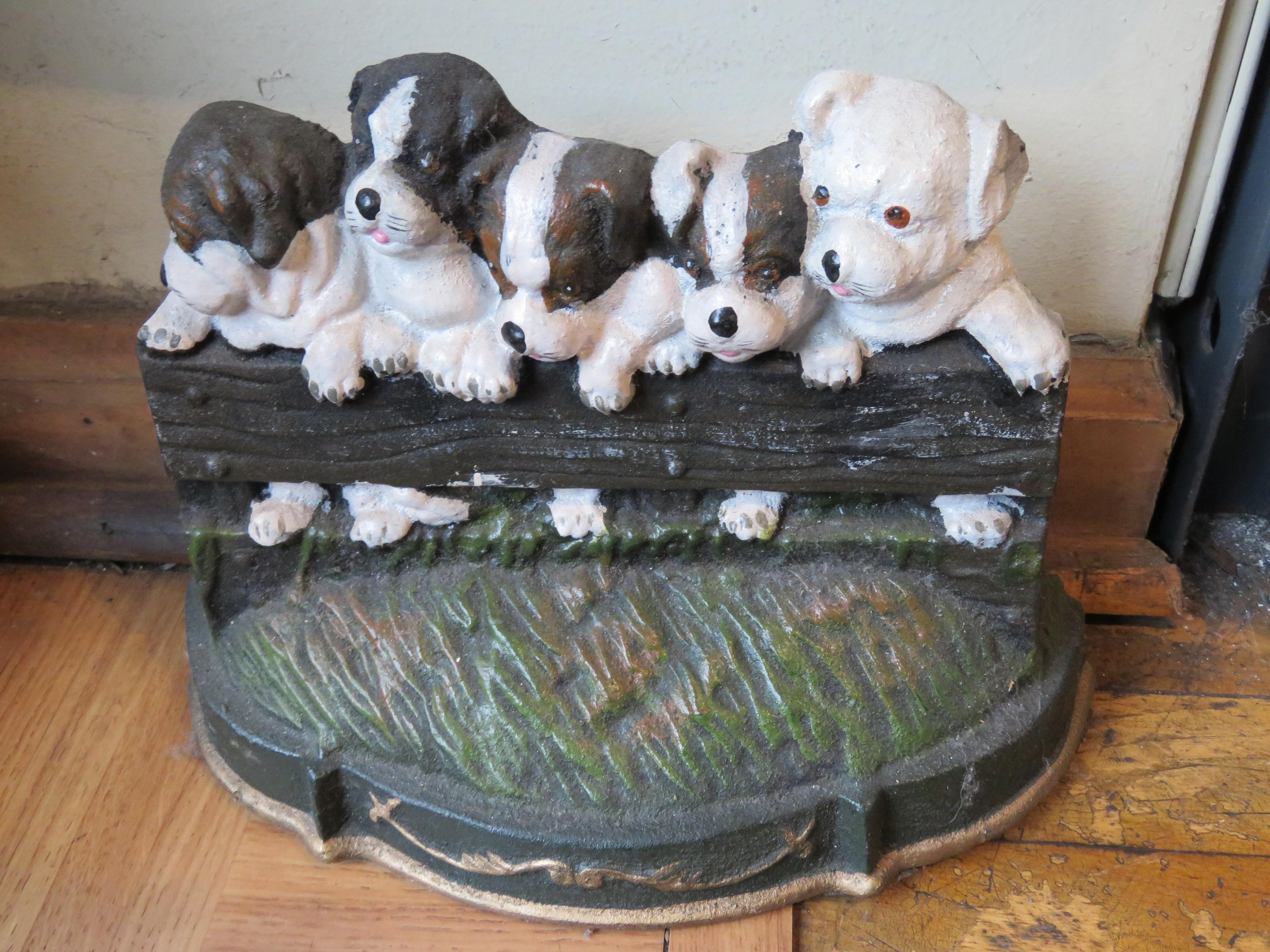 An Exquisite and Beautiful Quality Large Cast Iron Heavy Sculpted Handpainted Group of Dogs. Taken from an Important New York City Sutton Place, New York City Estate Collection. A Real Beauty!

Measurements: 12