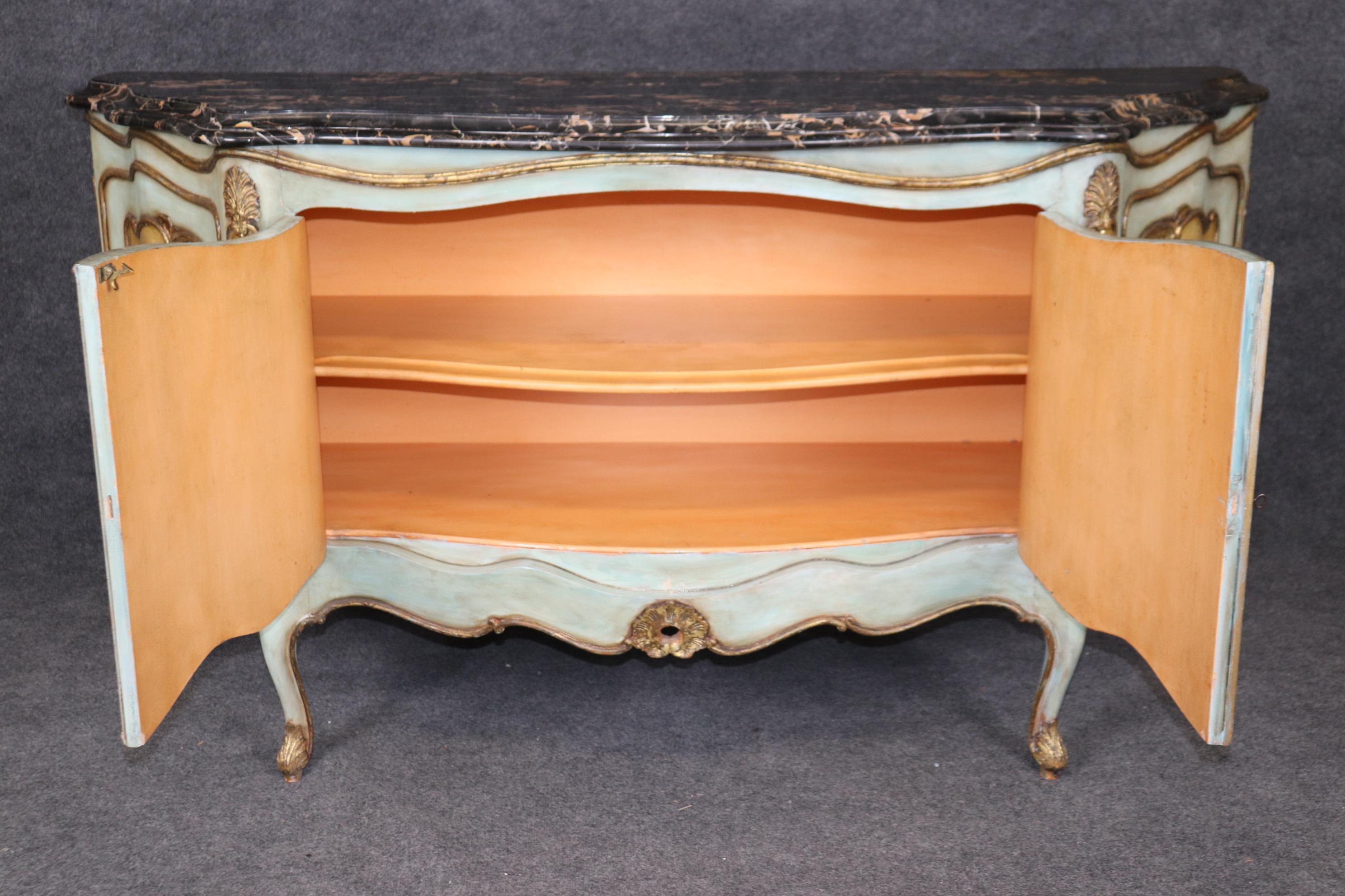 This is a spectacular painted black portor marble top sideboard. Look at the magnificent painted base and gorgeous slab of black portoro marble. The painted scenery shows maidens and mythical creatures and the color and design are absolutely