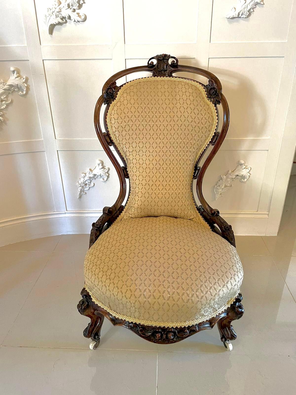 Outstanding Victorian carved walnut ladies chairs with outstanding carved detail to the lovely shaped back, carved rounded front rail, standing on lovely carved cabriole legs to the front out swept back legs with original castors.

A beautiful